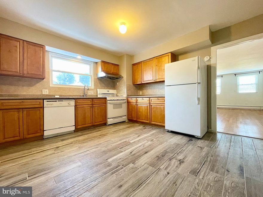 Spacious second floor, 2 bedroom (plus office), 2 bath duplex apartment situated on a quiet cul-de-sac in Bryn Mawr.  This unit features a large combined living room/dining room and adjacent eat-in kitchen with granite countertops.  Down the hall you will find a primary bedroom with en suite bath, spacious second bedroom, an office (or possible third bedroom), and a full hall bath with tile.  The property features gas heat, central air, and hardwood flooring.  Freshly Painted.  Off-street parking for two cars.  Washer, dryer, and refrigerator included.   Award-winning Radnor School District.  Close to parks, public transportation, and walking distance to shops & restaurants in downtown Bryn Mawr.  Available  Immediately.  Easy to show.