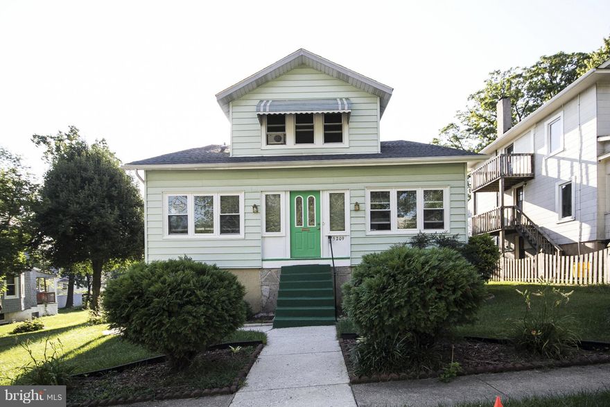 Large house in Hamilton, Keep as is with an income producing rental or easily convert to a 6 Bdrs, 3 full bath dwelling. Well cared  house on large lot. Kitchen and bath updated. Roof is about a year old. A lot of storage. Come view it, you will fall in love with its charm!