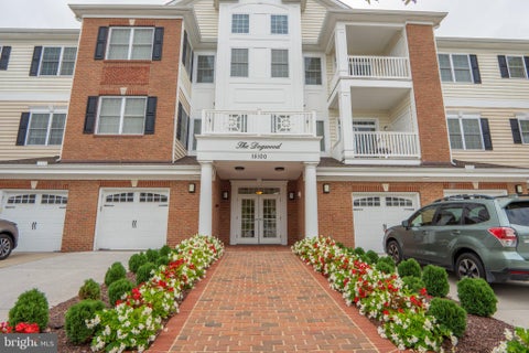 Photo of 15100 Heather Mill Lane #403, HAYMARKET, VA 20169 (MLS # VAPW2132992)