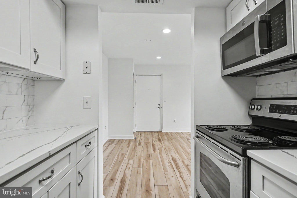 Photo of 14800 Rydell Road #201, CENTREVILLE, VA 20121 (MLS # VAFX2320848)
