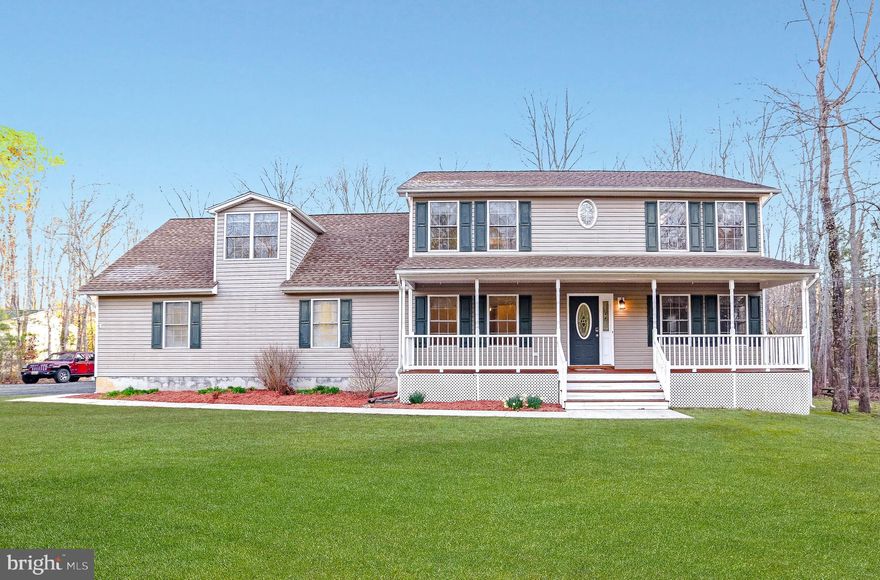 Charming Home on 1.67 acres on a Cul-De-Sac close to Shopping, Restaurants and only Fifteen (15) Minutes from PAX Naval Air Station.  Covered Front Porch Welcomes Guests. Open Floorplan on Main Level with a Huge Living Room.  Beautifully Upgraded Kitchen with Granite, Stainless Appliances, Counter Seating, Coffee Bar and Tons of Storage. Bright Breakfast Room overlooks the Private Backyard.  Dining Room/ Den / Office option located directly off the Foyer.  Lovely Primary Suite with a Custom Walk-In Closet and an Ensuite Bathroom with Soaker Tub, Separate Shower and Double Vanity. Four (4) Additional Bedrooms offer Plenty of Space to Spread Out.  Laundry Area has Additional Storage and is Conveniently Located on the Upper Bedroom Level with Full Washer and Full Dryer that Convey.  Unfinished Basement with Rough-In for future expansion, Sump Pump and Whole House Water Filter.  Large Attached Two Car Garage actually holds Four (4) Vehicles, plus Additional Workspace.  Garden Shed Conveys. This Attractive Home on a Private Lot has been Loved and Pride in Ownership Shows. Gorgeous.