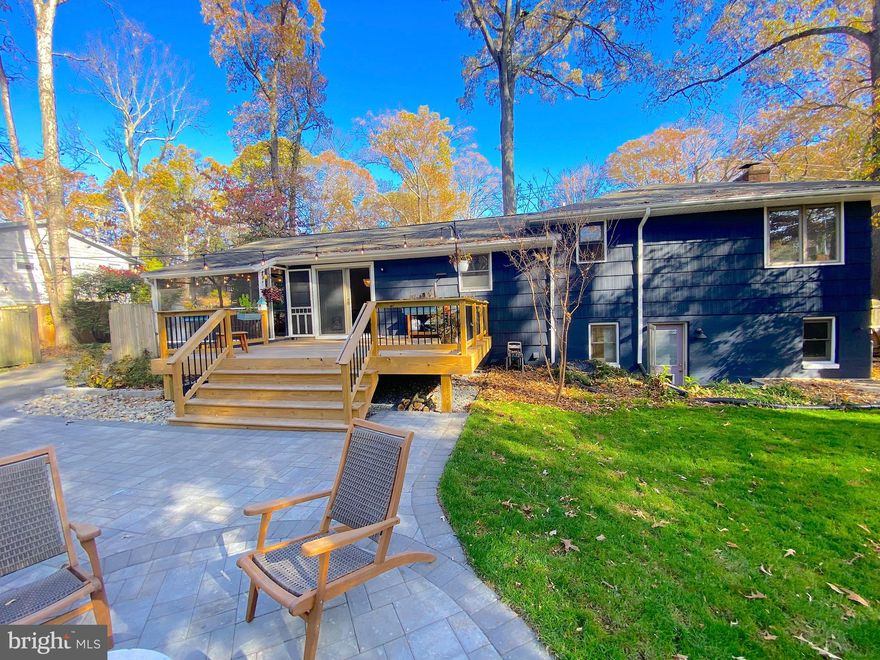 Here is the home you have been waiting to fall in love with! The location is incredible within the highly sought after water-privileged community of Cape Arthur, while conveniently located less than a block to Folger McKinsey Elementary. This home checks ALL the boxes and more.  The details are stunning throughout each aspect of this property. You will love the flow of the interior and how well it incorporates the screened-in porch, with the large deck and sprawling paver patio and beautiful yard. A wonderful place to call home that is perfect for everyday living and entertaining guests. The single car detached garage has power and is great for projects, storage or that special Sunday driver that you like to keep out of the elements. The community of Cape Arthur offers a wonderful park with its playground, basketball & tennis courts and room to play soccer or lacrosse. Water lovers will enjoy access to the community boat slips, boat ramp, small boat storage racks, piers and an expansive beach with picnic tables along the shore of the Magothy River. The community beach boast perfect views of North Ferry Point to the East Magothy Marina.