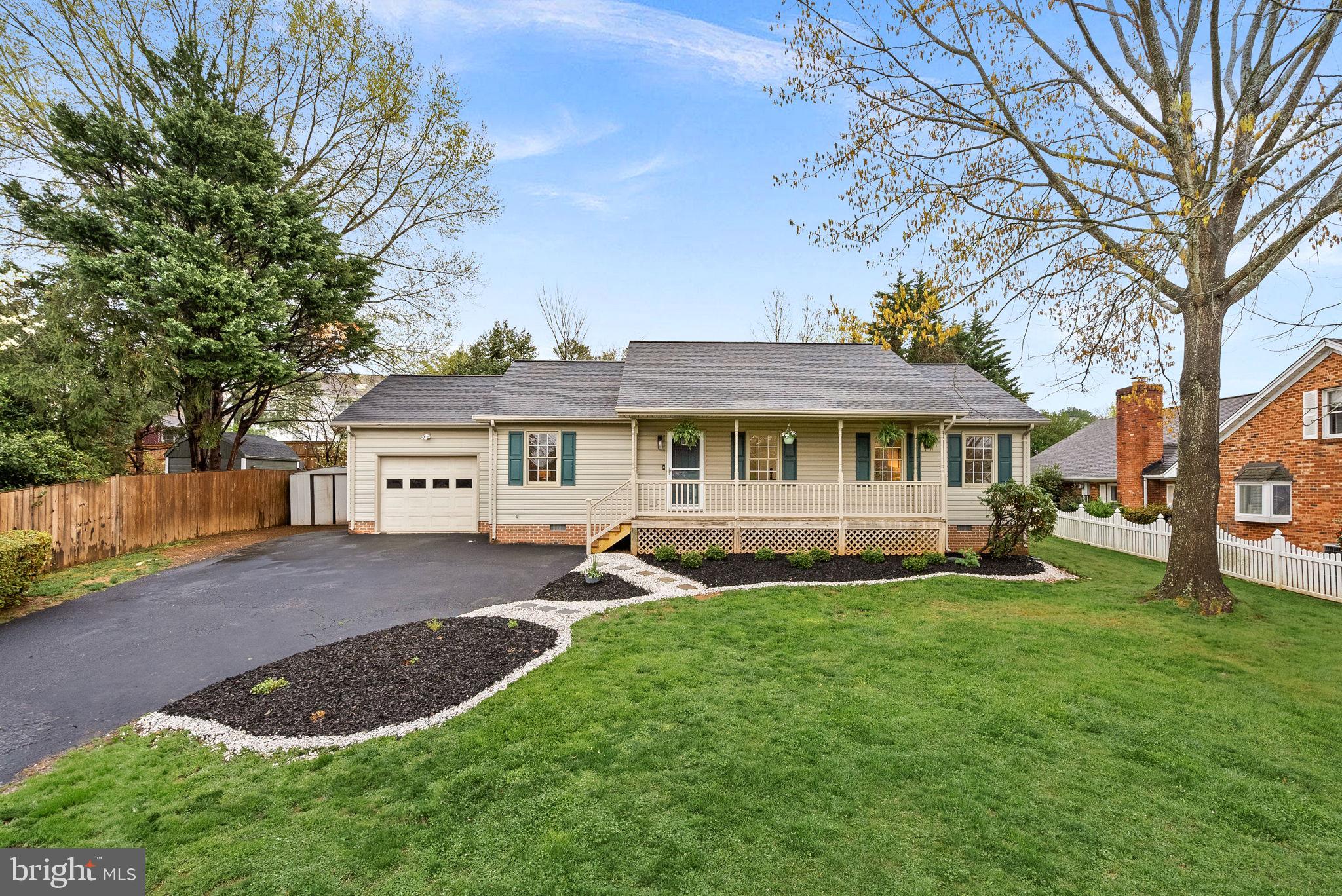 Welcome to 295 Jackson St, a charming 3-bedroom, 2-bathroom rambler offering over 1,200 square feet of comfortable living space with no HOA in the friendly Stuyvesant Acres neighborhood of Warrenton, VA. This beautiful home is move-in ready, with updated paint, plumbing fixtures, lighting, and flooring. The freshly updated kitchen boasts new stainless steel appliances and new quartz countertops, and seamlessly flows into the open-concept living and dining areas, creating an expansive and inviting atmosphere. Enjoy relaxing on the front porch or the back deck, which overlooks a spacious yard full of flowering trees, perfect for outdoor enjoyment and entertaining. Residents appreciate the neighborhood’s proximity to historic Old Town Warrenton, with a short walk to town and a variety of shops, restaurants, and cultural attractions. Outdoor enthusiasts will enjoy nearby parks and recreational areas, ideal for hiking, biking, and scenic day trips. With just a 30-minute drive to Shenandoah National Park and a 60-minute drive to Washington, DC, the location cannot be beat. The community’s well-maintained yards and walkable atmosphere make it a delightful place to call home. Come check it out today!