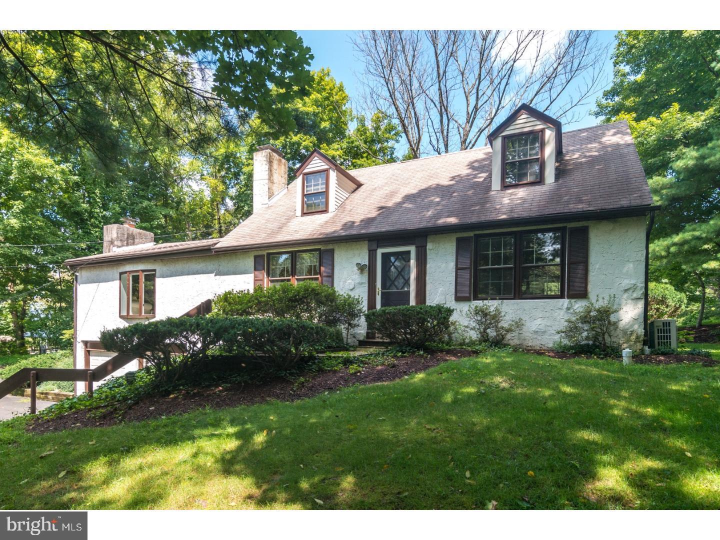 Charming Country Cape with French Flair – 1061 Cedar Lane, Wycombe
Looking for a spacious home in the country with a touch of French flair and a versatile layout? Welcome to 1061 Cedar Lane, nestled in the quaint village of Wycombe. Ideally located just 12 minutes from Newtown and 15 minutes from Doylestown, this serene setting offers the perfect blend of privacy and convenience.
Perched atop a gentle hill, this enchanting Cape Cod-style home offers scenic views and seclusion. Step inside to a cozy living room anchored by a rustic stone fireplace, seamlessly connected to a newly renovated eat-in kitchen featuring a generous island and modern finishes.
The open-concept great room and dining area extend off the kitchen, showcasing vaulted ceilings with exposed beams and a second inviting fireplace—perfect for gatherings or quiet evenings at home.
The spacious first-floor primary suite is a private retreat with abundant windows, a renovated en-suite bath, and tranquil views of the lush backyard. An additional room on the main level can flex to suit your needs—whether as a bedroom, office, library, or playroom—with a fully updated full bath just steps away.
Upstairs, you'll find two comfortable bedrooms that share a well-appointed full bath, ideal for family or guests.
The finished basement offers a versatile recreation room, a dedicated laundry space, and ample storage. Outside, enjoy your own private oasis: a brick patio garden area perfect for entertaining, overlooking an in-ground pool surrounded by nature.
