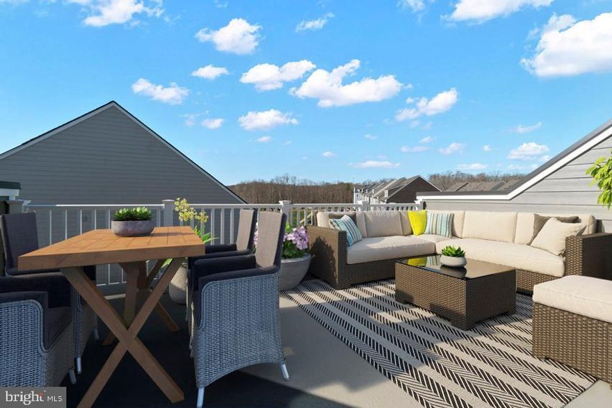 Brand new Stanley Martin 4-level townhouse end unit townhome with front-facing loft level terrace!
Welcome to The Maya! This exquisite 4 bedroom, 3.5 bath end unit townhouse is a modern dream come true. Enjoy the expansive 2,598 sqft of living space with an open concept floorplan perfect for entertaining or relaxing with family and friends. You’ll love the gourmet kitchen featuring sleek appliances and plenty of counter space for prepping your favorite meals. The lower-level recreation room is perfect for extra space and you’ll be thrilled to find a private rooftop terrace on the top floor – perfect for enjoying breathtaking sunsets while taking in the views! There's also an additional fourth-floor bed and bath suite ideal for guests or family members who need their own privacy. And don't forget about the rear deck, perfect for barbecues or just soaking up some fresh air! Step inside your primary suite oasis where you can enjoy the private en suite bath, complete with beautiful tile work, plus a spacious walk-in closet that will make getting ready each morning effortless. With oak stairs throughout this stunning home and quality craftsmanship around every corner, you won't want to miss out on this one-of-a-kind opportunity at The Maya! Photos shown are from a similar home. Contact us to schedule a tour or visit our model home today!

Potomac Shores is unparalleled when it comes to amenities. Experience the endless opportunities to bike, walk, run, swim, golf, workout, canoe, kayak, boat, fish, or simply enjoy a seat in front of the firepit at the Golf Club restaurant open to all Potomac Shores residents. Enjoy a walk throughout the tree-lined community on over 85 miles of wide paved trails or a hike on the intertwining woods trails. Sign up for a plot at the community Gardens, or Take the VRE train (projected 2024) to D.C. then back for a stroll through the future town center on the water. Enjoy the convenience of two of the three brand-new schools that have been completed.  Vist us today!