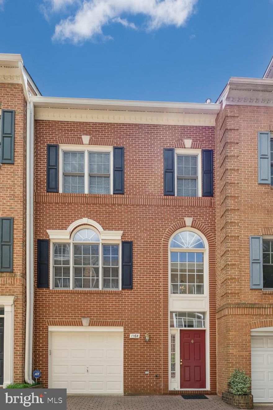 WELCOME to your next home!! Beautiful, move-in ready, luxury brick townhome w/a private garage *Premium Ballston location in the heart of Arlington, yet on a less traveled street *Short walk to the Ballston Metro station serving the Orange/Silver line *3-Finished levels with an Open Concept that has been meticulously maintained and freshly painted *The inviting main living area features: Rich hardwood floors, including hardwood staircase to 3rd level, a comfortable living/dining area w/natural light from the Palladian windows; open kitchen w/ample cabinet storage, gas cooking, beautiful granite, quality stainless appliances, and adjacent to a family/breakfast room w/Juliet balcony door overlooking the patio; as well as a convenient half bath on this level *The top bedroom level features: Hardwood floors; A private Owner's suite  can accommodate any size bed, plus has 2 closets. This bedroom retreat is en suite and boasts a fully updated gorgeous bath w/double vanities, custom flooring, and a double walk-in shower *You will also find 2 more bedrooms and an updated hall bath on this level *As you walk in to lower level you will find it to be fully above ground with natural light. You are welcomed by a 2-story entry foyer that leads to a main level bedroom/family room with a full bath. Walk out to a private patio for grilling/entertaining with door to the rear parking space. There is also access to the garage from this level *Other features: Gas furnace 2017; A/C 2019; Enviro UV Air Sterilizer 2022; Attic insulation & exhaust vents 2020; Gas water heater 2020; Quality Bosch washer/dryer 2016 to name a few *This highly sought after location has an incredible 91/100 Walk Score. Leave the car in the garage as it is walking distance to more than 80 restaurants, nightlife, the newly redesigned Ballston Quarter mall, shops, Cafes, gyms, Iceplex, Harris Teeter grocery, cinemas, Farmer's Market, library, parks and only a few blocks from the W&OD Trail *A commuters dream with easy access to I-66, Clarendon, Georgetown, DC, top local amenities, short drive to Amazon HQ2, Pentagon, Old Town Alexandria, Airport, and so much more. Outstanding value !!