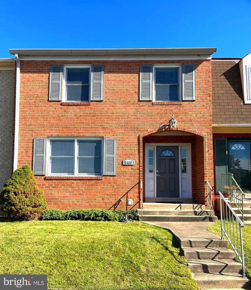 Beautifully updated 3 bed townhome with convenient commuter access. Enter in through the covered front porch to a spacious entry. Hardwoods throughout the main level. Large family room leads into separate dining room. The gourmet, eat-in kitchen boasts white cabinetry, quartz countertops, tile backsplash, and stainless steel appliances. Dining area off kitchen walks out to the beautifully hardscaped and landscaped rear yard with flagstone patio. Half bath on the main level. Upstairs, find three sizable bedrooms and two full baths. Primary bedroom has a large sitting area with closet, making for a great home office or relaxation space. The primary bedroom has a large walk-in closet and its own renovated bath with glass shower and stunning tile. Hall bath is fully updated with wall to wall subway tile and quality fixtures. Ceiling fans in all bedrooms. The finished lower level has a half bath, a large rec room, wet bar, and additional space for rooms. Laundry in the unfinished section, along with great storage space. Conveniently located with easy access to 495, 395 and many local parks nearby. Two parking spots.