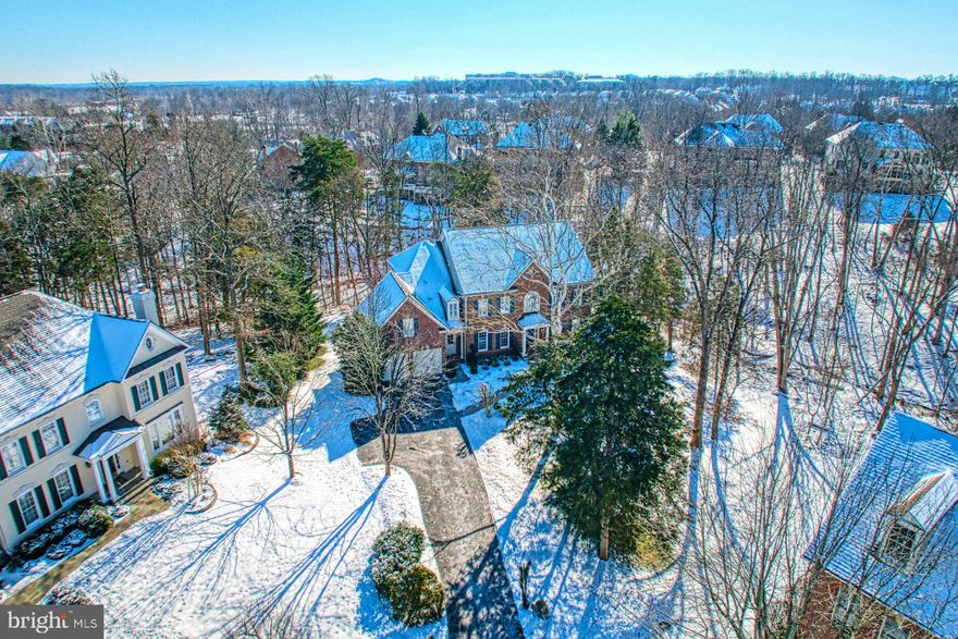 OFFERS DUE BY MONDAY 1/27 AT 5:00 PM.   

Shaded by lush, mature landscaping in sought-after River Creek, this timeless retreat welcomes you with thoughtful design, elevated details, sophisticated finishings, and a memory-making centerpiece kitchen. Boasting an airy 5,125 square foot floor plan, where updated paint, soaring windows, wide plank floors, and fashionable fixtures add interest, you’ll enjoy a lifestyle of both seamless indoor/outdoor entertaining and cozy weeknight’s in. Offer gourmet bites, help with homework, or pour cocktails from the center island of your luxe chef’s kitchen. Here, sleek high-end appliances, endless soft-close cabinetry, and sunny vantage points allow you to both complete recipes and keep an eye on sunning kitchen herbs on the expansive deck. Ideal for summer parties and tranquil mornings, your .54-acre lot offers privacy along with green space for yard games and firefly fun. While living vistas allow for holiday celebrations, tending to business, and lower-level game nights, you’ll rest and recover within four and half inviting baths and five peaceful bedrooms. Host guests within the basement escape, then linger in the upper-level primary where a custom closet keeps garments as your spa-bath or modern shower soak away cares. While on tour, explore the updated laundry and mudroom with convenient cabinetry, and two car garage designed for weekend projects and sheltering favorite rides. With refreshed flooring, newer roof, energy-efficient appliances, freshly painted interior/exteriors, and more, you’ll have peace-of-mind for years to come, along with enviable end of cul-de-sac positioning. Sited within a community of uncommon attention to natural beauty, River Creek showcases championship golf, scenic walking trails, pool, and clubhouse. Just beyond the community gates, routes lead to vibrant Village at Leesburg, Wegmans, OneLoudoun, commuter destinations, and charming Historic Downtown Leesburg.