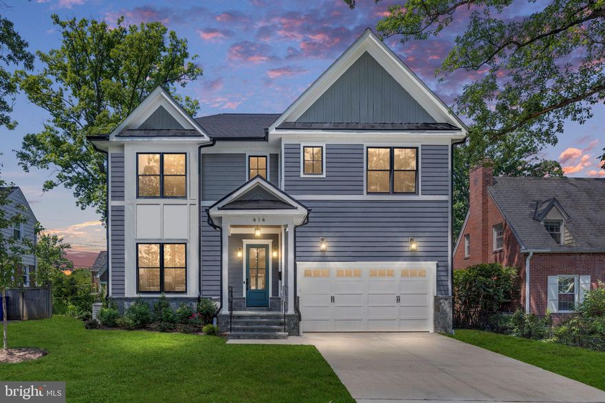 *Open House Canceled* Welcome to your new home at 414 Monroe St in the heart of Ashton Heights! Just a short walk from Ballston Quarter, the Virginia Square Metro, and all the shopping and dining Clarendon has to offer. This craftsman style new build by local builder Enhanced Homes has just been completed and is ready for its next owner. Featuring approximately 5,300 of finished living space over three levels with 5 bedrooms, 5 and a half bathrooms, a roughly 400sqft two car garage and screened in rear porch overlooking the quiet, fenced in rear yard.
As you walk into this gorgeous home, you are greeted by the stunning white oak flooring and wainscoting spanning the foyer, past the office and dining to the open concept primary living area with a spacious living room, breakfast area, and a gourmet kitchen, perfect for entertaining guests. The kitchen’s designer cabinetry and white quartz counters are accented beautifully by the KitchenAid appliance package and black hardware finishes spanning throughout the space. A gas fireplace surrounded by a shiplap accent wall leading to your private screened in porch and mudroom complete the main level of this home. 
The lower level of the home features a wide open rec room complete with a recessed wet bar and beverage fridge, a workout room with additional storage closet, an oversized guest suite and the properties 5th full bathroom. Additionally, the area way in the basement lets in ample light to basement space and allows for quick and direct access to the rear and side yards.
Schedule a tour today to experience all that 414 North Monroe Street and the incredible Ashton Heights Neighborhood have to offer.