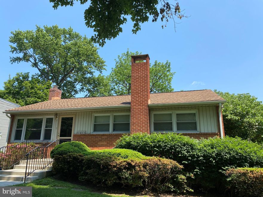 Such a wonderful starter home and great opportunity! Green is the color of instant equity, and if you love the color green this well-maintained and expanded rambler is for you! Green as in, well, green tile in the bathroom and green wall coverings, nothing that a few cans of paint can’t fix. Green as in a deep expansive fenced in back yard for all sorts of outdoor fun. With a little bit of imagination, this home is a great opportunity to own in a cherished Kensington community. The kitchen features silestone counters and abundant 42” cabinets, and opens to a sun drenched family room addition, with a sliding door to a spacious deck overlooking the private yard.  BBQ central! Main level boasts hardwood floors, 3 bedrooms and 1 full bath.  The lower level just asks for a coat of light-colored paint to bring it to life. Enjoy the brick fireplace and retro dry bar! Double pane windows on main level. Move in ready and update as you go along. Well-cared for home: 2016 chimney repaired, 2016 new furnace, 2014 new stoop and walk way. The roof is high grade, date uncertain. Sold STRICTLY AS IS. Two large sheds for all your tools, toys, kayaks, bikes – you name it! Close to Rock Creek Park, Wheaton Mall, Red line Metro, Antique Row and a plethora of shops and eateries in the town of Kensington. OFFERS DUE TUES JAN 11 3pm