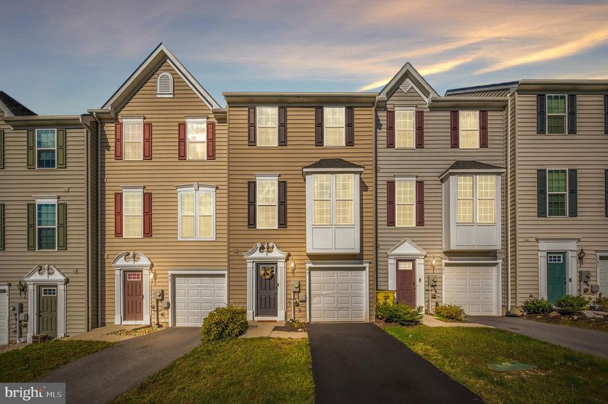 Step into a world of comfort and convenience at 97 Montreal Way. Located in the desirable Potomac Station community, this 4 bedroom, 3 full bath and 1 half bath townhome has everything you could ever want. As you enter, the gleaming hardwood floors in the foyer set the stage for the elegance and warmth found throughout the home. The first level surprises with a versatile fourth bedroom boasting its own en-suite bathroom and walk-in closet. This space could be utilized as a guest bedroom, recreation room, play room, etc. The options are endless! With seamless access to a walk-out basement, your connection to the outdoors is effortless. The heart of this home is the main level, featuring a spacious gourmet kitchen designed for culinary enthusiasts. Hardwood floors, granite countertops, rich espresso cabinetry, and a large island create an atmosphere of culinary delight. The peninsula adds extra barstool seating and countertop space, making it an ideal space for entertaining. Connected to the kitchen is a generous family room, illuminated by a beautiful bay window that welcomes an abundance of natural light. Ascend to the upper level to discover an oversized primary bedroom, complete with a walk-in closet and a luxurious attached bathroom. The primary bathroom offers ceramic tile, dual vanity, and a large roman shower with ceramic tile surround—a perfect retreat after a long day. Two additional bedrooms, upstairs laundry, and a well-appointed hallway bathroom complete this level. Convenience is key in this prime location, offering easy access to major highways I-81 and I-70. Discover a lifestyle of ease with proximity to dining, medical facilities, shopping, restaurants, and top-notch schools. This home represents a perfect blend of elegance, functionality, and location. Don't miss the opportunity to make it yours! Schedule your viewing today!