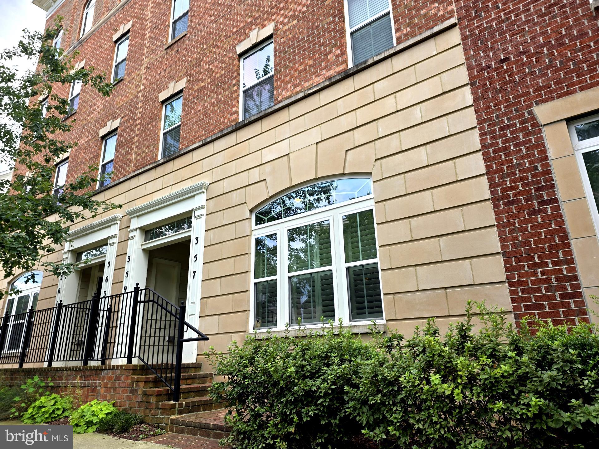 Welcome to this well-kept 3-bed, 2.5-bath townhome-style condo at 357 Community Center Ave in Gaithersburg's Parklands at Watkins Mill. At 1,868 sq ft, it features hardwood floors and an upgraded half bath on the main level and an attached garage. It's near the end of the street just steps from the common green area.
Inside, you'll find a bright open layout with a gourmet kitchen, dining, and living areas that flow together nicely. Upstairs: three roomy bedrooms, including a primary with dual walk-ins and private bath. One of the bedrooms has its own balcony for relaxing outside.
Built in 2012, the neighborhood offers great perks like a clubhouse, pool, tennis courts, gym, playgrounds, and walking paths. Commuter friendly walk to the MARC station as well as close access to 270 and 355. Closeby are Costco, and the Shops @ Spectrum Center, or take a short drive to Downtown Gaithersburg, RIO, Crown, and Kentlands. A solid spot in a sought-after area!