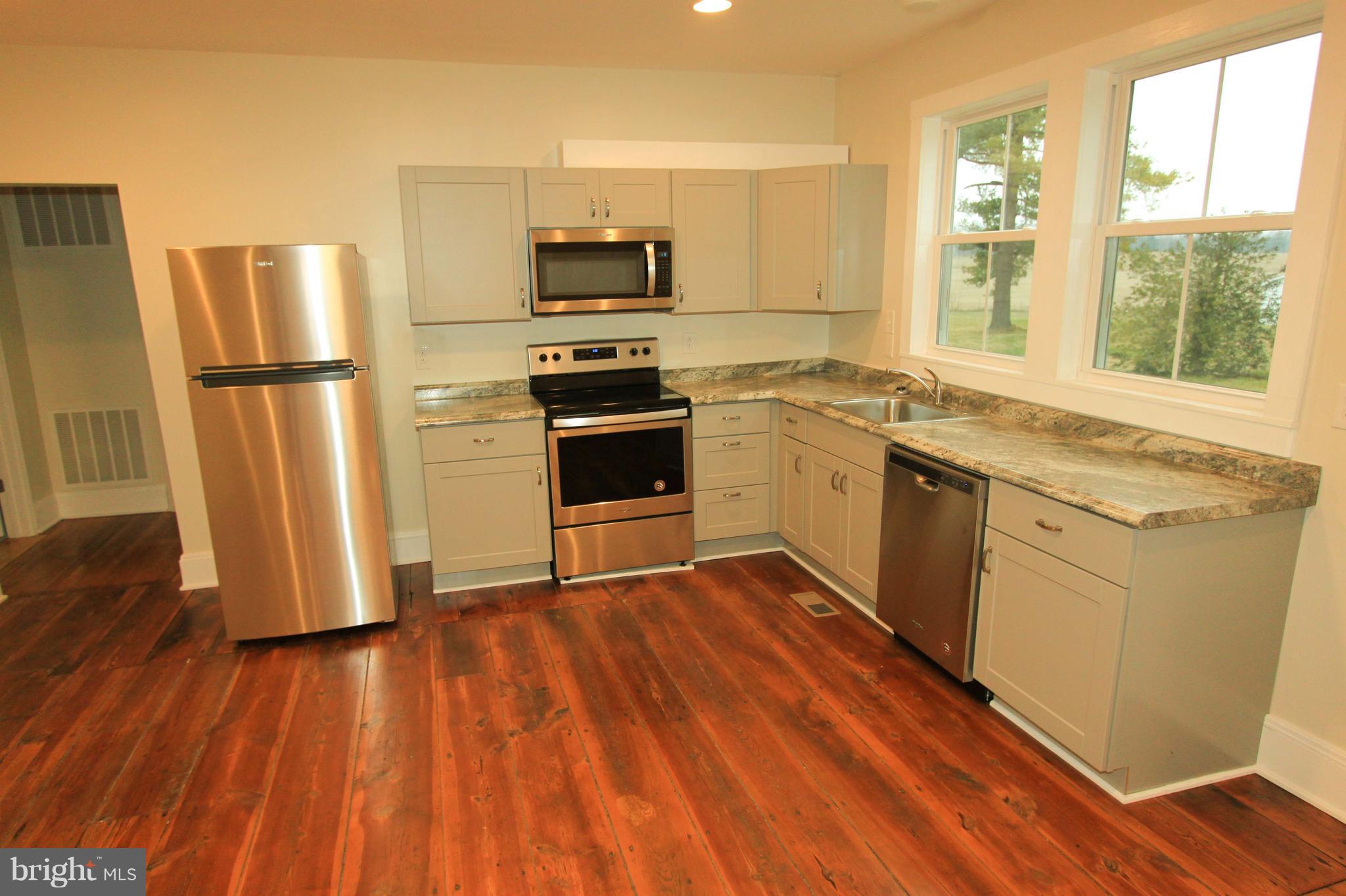 Beautifully renovated, massive, one bedroom apartment located in historic building sitting along 340 in Rippon. Original hardwood floors still intact. Washer and Dryer included.