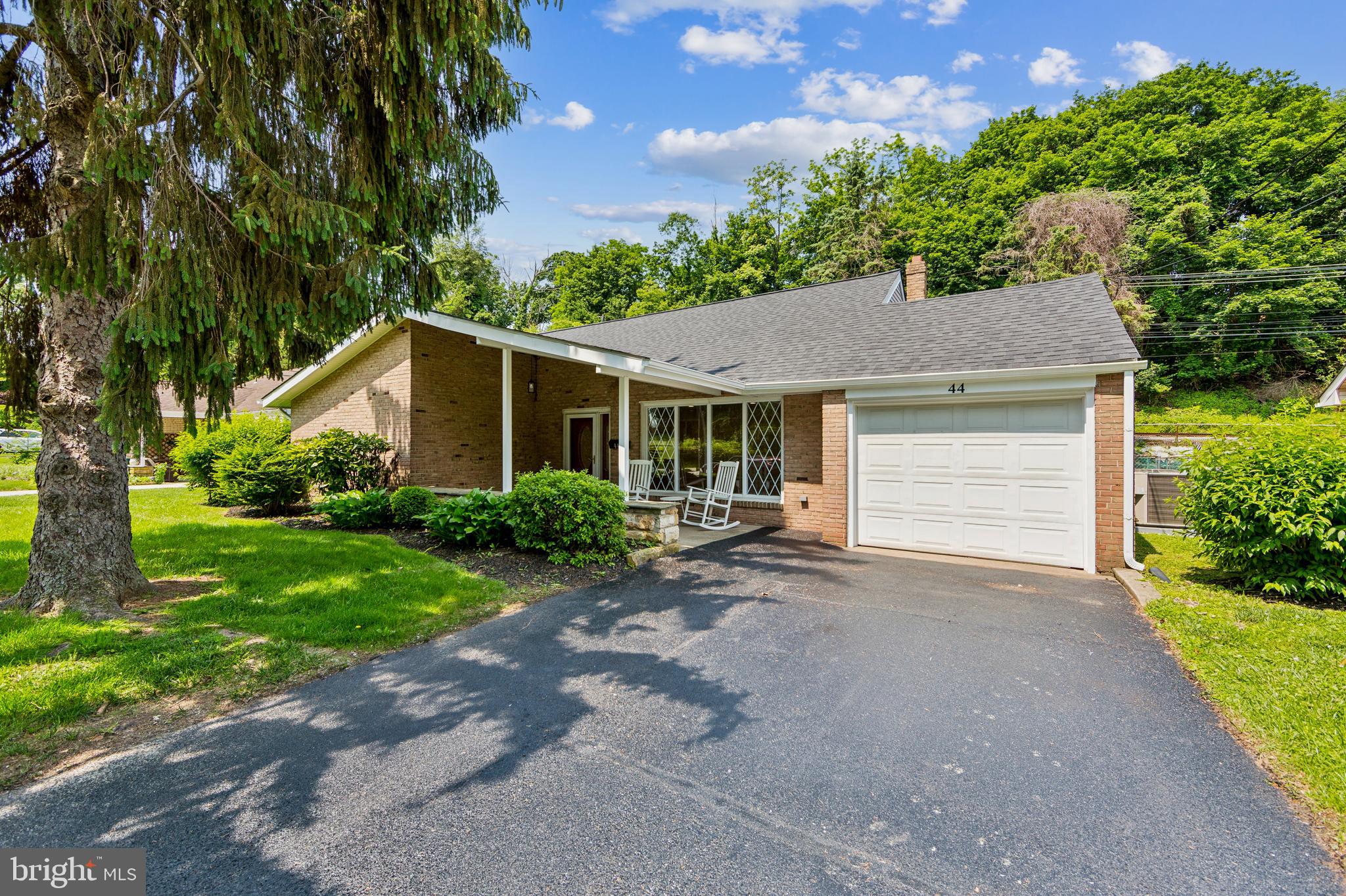 "Welcome Home "to this completely remodeled ranch home centrally located in the heart of Springfield. It is a stones throw away from the park, township building, library and within walking distance to stores, shops and local restaurants.
The exterior front has a large covered front porch. Enter in the front door to a very large living room with recessed lighting and the original hardwood floors that have been refinished to their natural beauty. The grand window lets in the sunlight. which makes this house so bright and cheery The dining room and kitchen are combined also with recessed lighting. The kitchen has white shaker style cabinets, stainless appliances , garbage disposal and a large island for prepping meals while entertaining with family & friends.
The one set of wall cabinets is equipped with a bar refrigerator, wine rack, wine glass racks and glass cabinets also for your entertaining pleasure.
There is an entryway off of the dining room into the family room that is carpeted and has recessed lighting with a slider that leads out to the backyard.
The attached garage has an inside access to a hallway that leads to an extra bedroom, office or playroom with recessed lighting, a ceiling fan and is carpeted along with the laundry room at the end of the hall which includes a cedar closet.
The other two bedrooms are a great size with ceiling fans and hardwood floors. The updated hall bath has a tub and a modern 60" floating vanity. The primary bedroom has a beautifully tiled bathroom with a stall shower.
This house has a new roof, siding, facia board, gutters. along with completely updated HVAC, plumbing and electric.
This home is just waiting for it's new owners to move in , unpack and call it "Home Sweet Home"