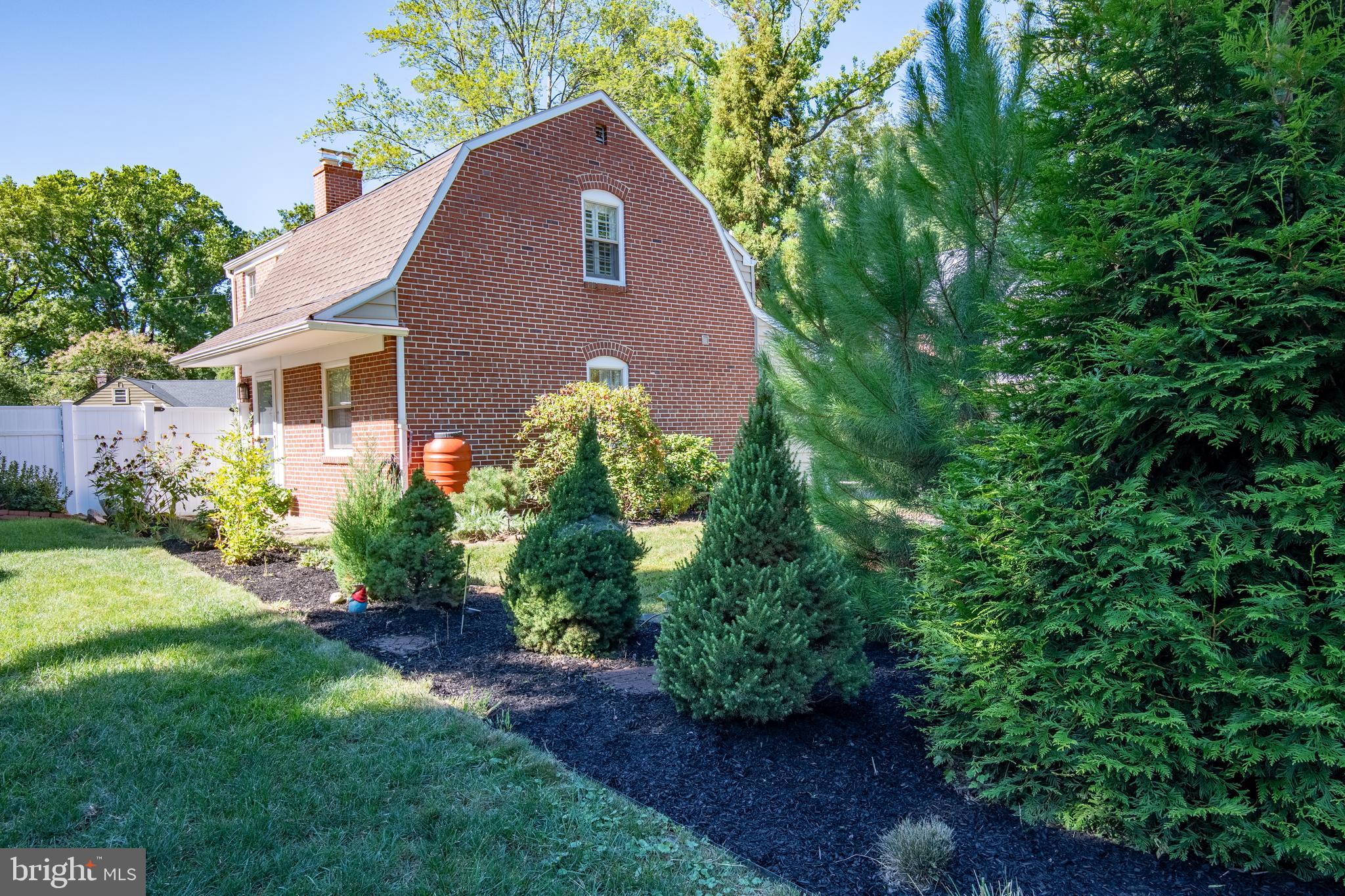 Welcome to 410 E Wynnewood Road, a beautifully maintained brick colonial in the sought-after Shortridge Park neighborhood. This move-in ready home blends timeless character with thoughtful updates, offering 3 bedrooms, 1 full bath, 2 half baths, and 1,861 square feet of comfortable living space.
The main level features a bright living room anchored by a wood-burning fireplace, creating a warm and inviting centerpiece for gatherings. The updated kitchen offers modern finishes and generous workspace, with a convenient entrance that steps right out to the driveway — making it easy to bring in groceries or head outside with ease. The adjacent dining room is ideal for everyday meals or special occasions and includes glass doors to outside living on a beautiful deck. Off the dining room, a spacious den/home office provides flexible living space.
Outdoors, the fully fenced yard is designed for enjoyment and function, with mature landscaping, play equipment, and a garden shed for storage. The deck and patio create perfect spots for dining al fresco, entertaining, or simply relaxing in a private setting. ***Please park on Rockland or Merion Aves when visiting the home.
Upstairs, three comfortable bedrooms include thoughtful details, with two featuring beautifully built-in closets that maximize space and style. An updated full bath continues the home’s fresh feel, while two additional half baths add everyday convenience. The lower level extends your options with a finished family room — a perfect space for movie nights, play, or a quiet retreat.
Set in a true sidewalk neighborhood, this home also offers outstanding walkability. You’ll be within steps of the train for an easy commute, close to Wynnewood Shopping Center for everyday essentials, and just a short stroll to downtown Narberth with its shops, restaurants, and community events. Adding to the appeal, the property is part of the award-winning Lower Merion School District.
With its classic brick exterior, versatile living spaces, and vibrant location, this Shortridge Park gem delivers the perfect combination of charm, comfort, and convenience. Don’t miss the opportunity to make it yours — schedule a showing today! ***If no driveway stops available please park across the street at Merion Ave or Winchester Ave.