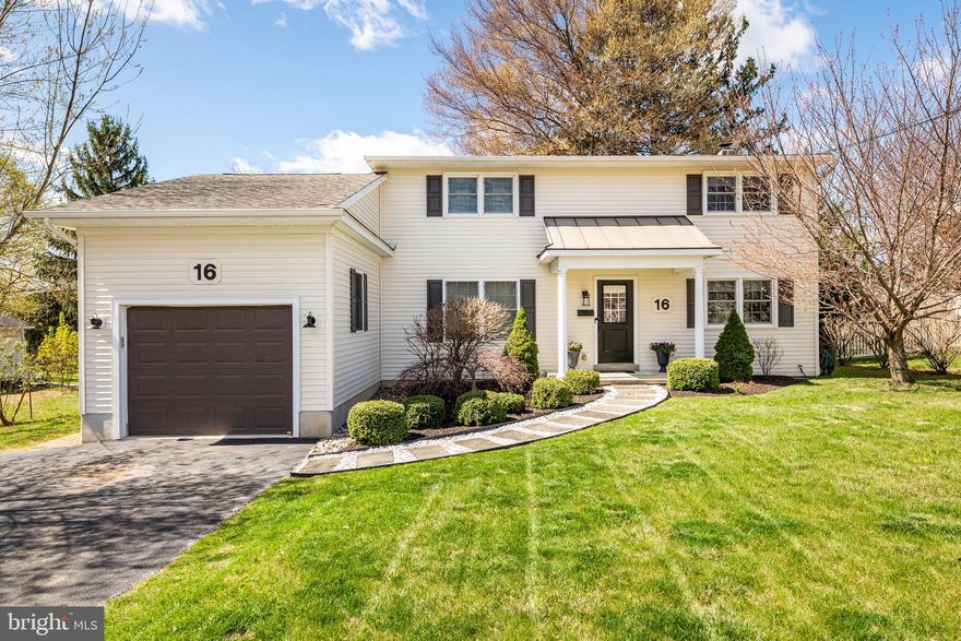 Welcome to 16 Crumley Ave, a turn-key 4-bedroom, 3-bath home that effortlessly combines warmth, character, and convenience—all just minutes from downtown Malvern with its vibrant shops and restaurants and Greentree Park. Curb appeal abounds with classic black shutters, a sleek black garage door, and a crisp slate walkway that leads you to the inviting front covered porch. Inside, natural light and hardwood floors flow throughout the open-concept main level, creating a space that feels both polished and comfortable. Charming architectural touches in the home include a brick accent wall, exposed wood beams, and shiplap walls. The heart of the home is the kitchen, where white cabinetry, granite countertops, and stainless steel appliances offer timeless style and functionality. The kitchen is open to the dining area and living room—complete with a cozy gas fireplace and oversized picture window—making it easy to entertain or simply relax. Just off the kitchen, a covered porch invites quiet moments with coffee or cocktails, rain or shine.
The first floor also offers flexible living with a full bathroom, a private office, and a fourth bedroom that’s currently functioning as a playroom. Thoughtful extras like a mudroom with custom cubbies, a separate laundry area, and an attached garage check all the practical boxes. Upstairs, you'll find three spacious bedrooms and two full baths, including a serene primary suite with a walk-in closet and an en-suite bathroom featuring a double vanity and shiplap accent wall. The secondary bedrooms share a bright, updated hall bath with a shower/tub combo. The finished lower level adds even more living space—perfect for movie or game nights, and casual gatherings—complete with a bar and beverage fridge. A sliding barn door opens to generous storage, and Bilco doors offer a walk-up exit to the yard. Out back, a custom two-tier deck leads to a covered patio wired for TV, creating an outdoor living room that’s perfect for warm evenings under the stars. The fully fenced yard offers privacy and peace of mind for both pets and kids. Located in award-winning Great Valley School District, and just a short drive to the Paoli and Malvern train stations, this home is tucked in a quiet neighborhood yet close to everything—parks, schools, shops, and dining. Come experience the lifestyle and ease that this home has to offer.