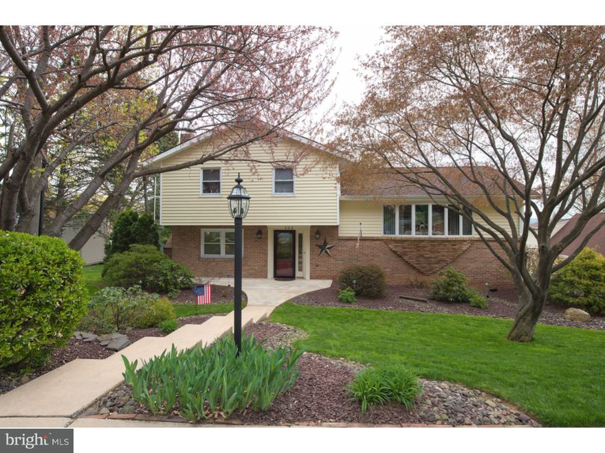 Every inch of his Exeter split level has been updated and remodeled with attention to detail evident where ever you look.  Enter this home into the family room with engineered dark walnut hardwood floors, paneled walls and fireplace and remodeled half bath.  Up a few steps is the living room with gorgeous oak hardwood floors (which is throughout the house) and large bay window which flows into the dining room giving a nice open feel.  The dining room opens into the new kitchen with a breakfast bar and brand new custom cabinetry, ceramic tiled floor and glass tiled backsplash, high-end appliances consisting of a double oven, stainless steel range hood and refrigerator, and a whisper quiet Bosch dishwasher that the only way you know it is on is to see the digital readout that projects onto the floor.  Up a few more steps is where you will find the master bedroom with full bath that has been newly updated with ceramic tile floors, wainscoting, new vanity and faucet and light fixtures.  You will find two more nice sized bedrooms and the hall bath that has also been remodeled with ceramic tiled floors and walls, new vanity and sink, fixtures and lighting. Nearly every room including the hallway has crown molding. Off the family room are the sliders that take you to a new 22x17 covered patio and above ground pool (new pump) with composite decking. The back yard is fully fenced in and the entire property boasts mature landscaping. 2 car side entry garage. The entire home was re-insulted before it was re-sided making it very cost effective to heat/cool.  Newer roof with 40 year shingles, new hvac/ac with high efficiency heat pump 2 years old. New digital touch-pad thermostat that you can control from your phone.  This home has charm and character that you just don't get these days.