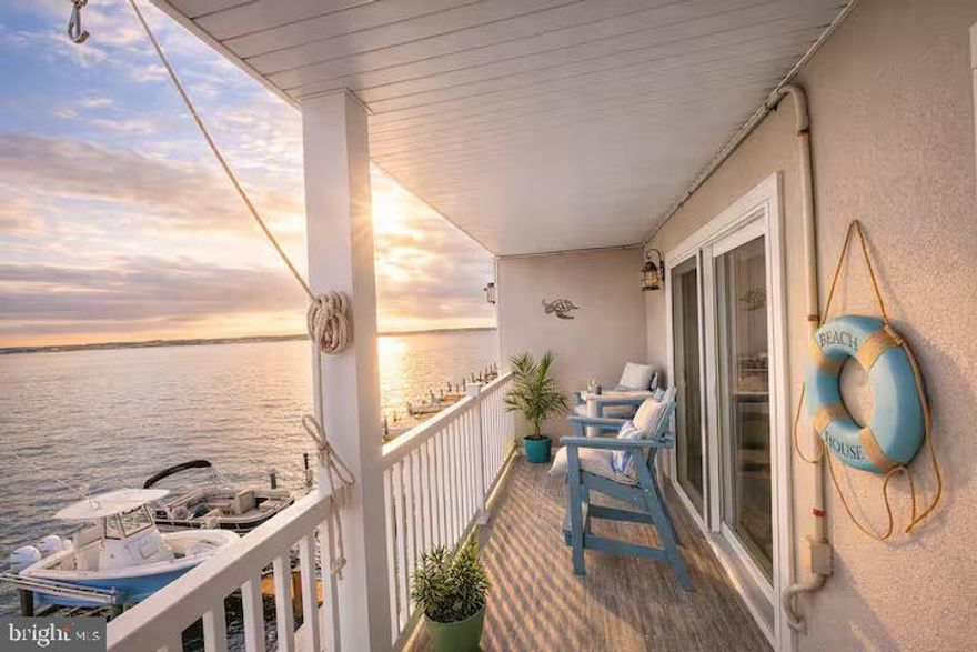 Welcome to South Bay Condos, where Million Dollar Views are waiting for you! This top-floor, direct bayfront condo offers some of the most stunning bay, sunset, and boat-watching views in all of Ocean City. Enjoy front-row seats to the OC Air Show, three sets of Fourth of July fireworks, and breathtaking sunsets every evening. Located on the highly desirable Bayshore Drive, a short walk from the North End of the Ocean City Boardwalk and Jolly Roger Park, this 2-bedroom, 2-bathroom unit provides the ideal mix of relaxation and excitement. This unit conveys with a boat slip #301. The newly installed high-end boat lift with remote included provides quick and easy access to the Inlet — a true boater’s dream.

The condo has been beautifully updated, featuring oversized tile floors, a modern kitchen with soft-close cabinets, granite countertops, premium stainless steel appliances, and a full-sized washer/dryer. The centralized HVAC ensures year-round comfort. The spacious bayfront master bedroom opens onto a large balcony, offering perfect views of the boat traffic and surrounding scenery.

South Bay is a well-maintained 6-unit building with recent upgrades, including a new roof, renovated rear balconies, front walkways, vinyl railings, and a new storage closet. The unit is assigned an exclusive-use boat slip with a 10,000 lb. high-speed boat lift and includes an assigned parking space.

Whether you're looking for a full-time residence, vacation getaway, or rental investment, this unique waterfront property checks all the boxes. The unit has perfect 10/10 reviews on VRBO and Airbnb, with guests highlighting the location and views as exceptional. This is your opportunity to own a piece of coastal paradise with unmatched views in Ocean City!