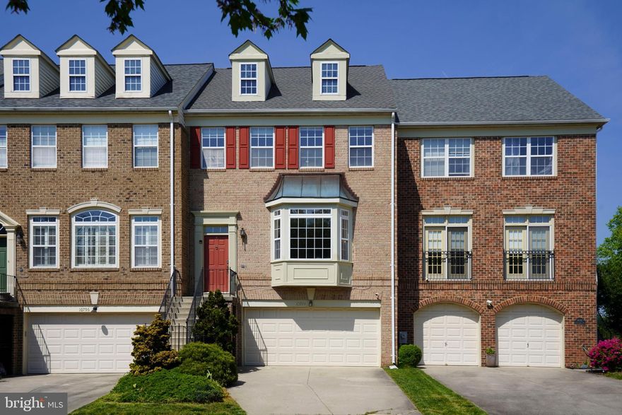 One of best views in Waverly Woods, back to the Golf Course. 3 Level Finished Spacious Townhouse with 4 Bedrooms, 3.5 Bathrooms, and 2 Car Garage. Hardwood Floor on main level. No carpet.