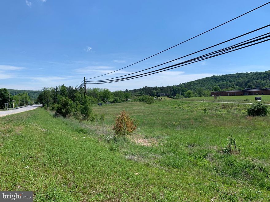 Parcel of land situated between the split of north and south Route 61 in the Deer Lake area.