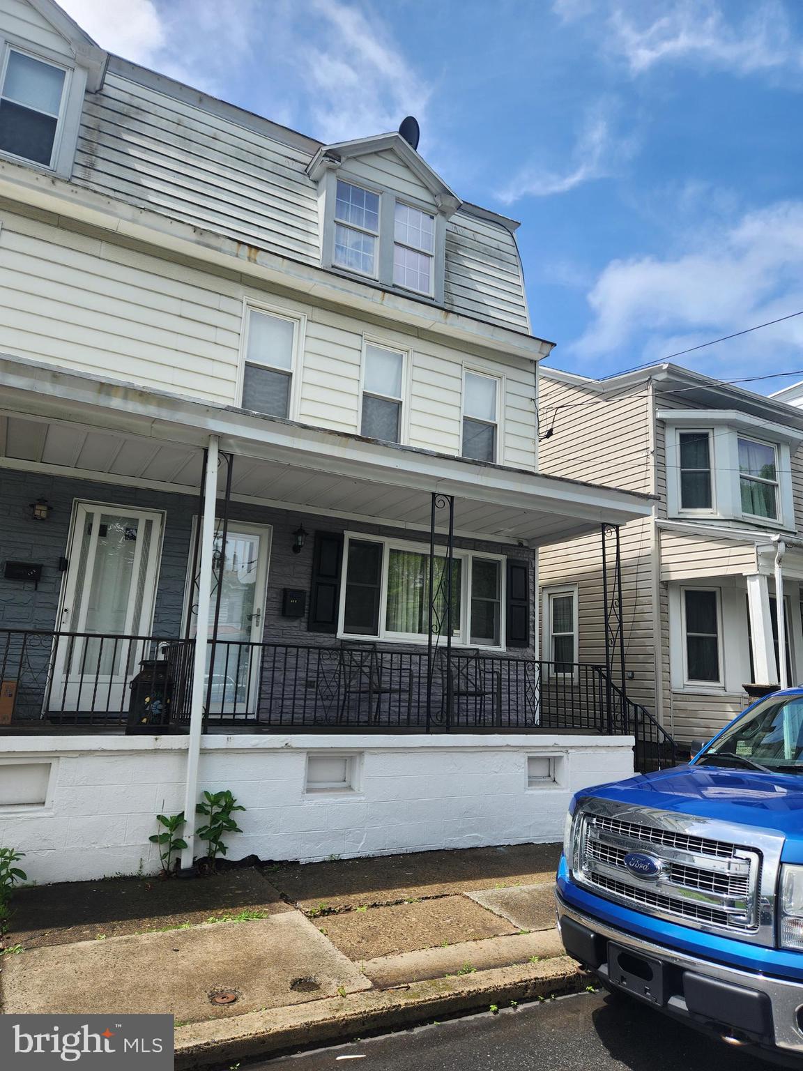 Large semi detached home located on the quaint Parkway in Schuylkill Haven. First floor has a large open living room area with plenty of space to make a dining room. The kitchen is bright with plenty of cabinet space. Conveniently located off the kitchen is a half bath with the laundry hookup. Also off the kitchen is a mudroom area that would be great to store lawn and gardening tools. The yard is very spacious and leads to off street parking in the back. The 2nd floor has 3 private bedrooms with closets and a small additional room that can be made into a walk in closet if wanted. Full bathroom has vanity and a tub/shower combo. The 3rd floor is finished with 2 rooms, one is a walk through. The drywall and spackling is completed on the 2nd floor. It has not been painted. Economic coal heat with radiators will keep this house toasty. With some TLC, make this your new home. Schedule your viewing to see all the potential it offers.