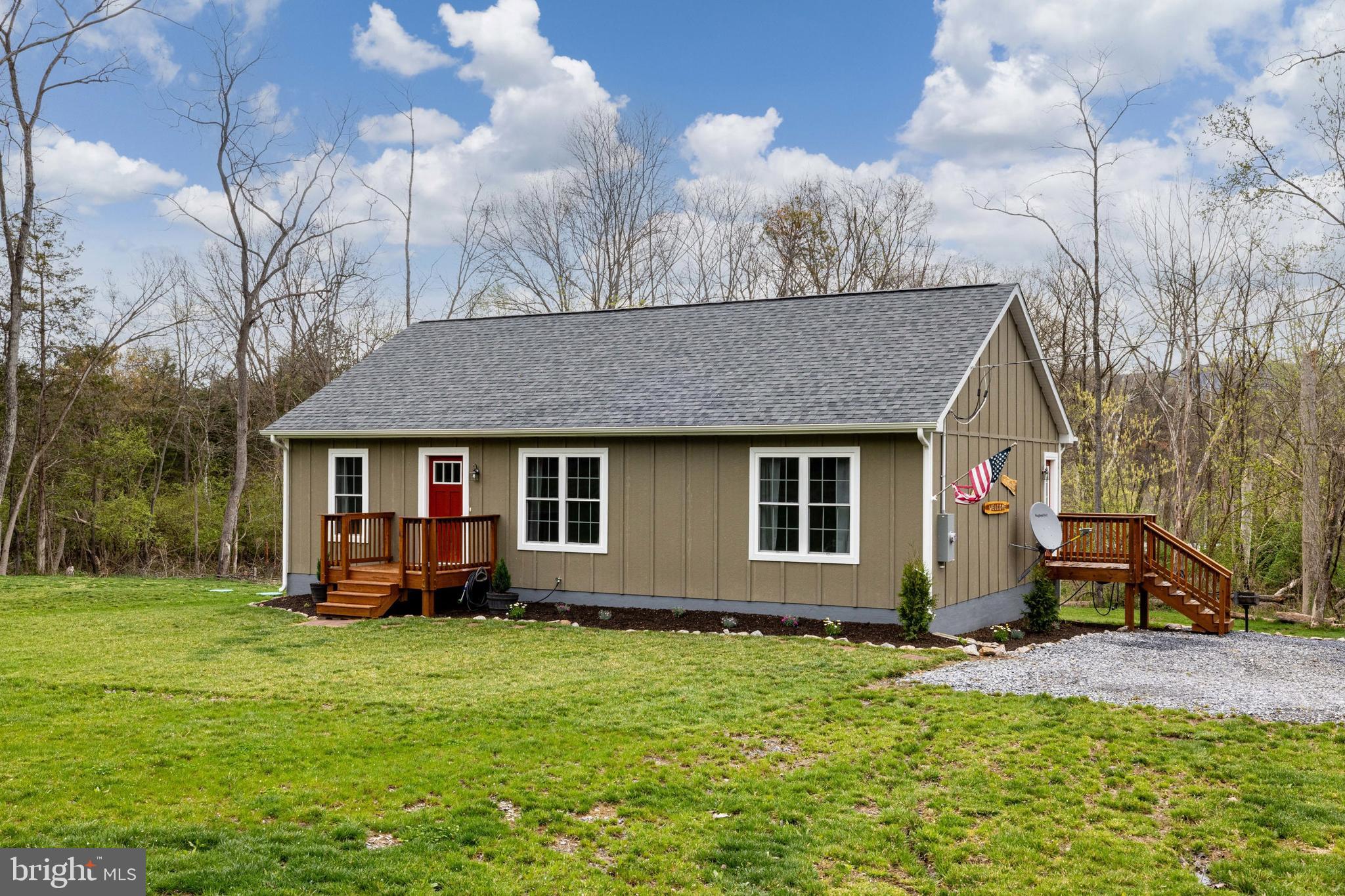This successful short-term rental (STR) built in 2023 offers an incredible opportunity for investors or anyone seeking a peaceful retreat in the heart of the Shenandoah Valley with access to the Shenandoah River less than 200 feet away! Featuring two bedrooms and two full bathrooms, plus a bonus space, the home boasts an open-concept layout designed for comfort and functionality. Situated on a total of nearly 1.5 acres, this listing includes two additional buildable lots — perfect for expanding your rental portfolio or ensuring privacy for years to come. Bordering the George Washington National Forest and just a stone's throw from the South Fork of the Shenandoah River, the location is a dream for nature lovers and outdoor enthusiasts alike. There is no active HOA and short-term rentals are allowed by right, just obtain a business license from the Commissioner of Revenue! The home is less than two hours from Washington D.C., and just minutes from Luray Caverns, the Shenandoah National Park, and hiking to Kennedy’s Peak in the George Washington National Forest. After a day of adventure filled with hiking, floating, and fishing, relax in the backyard hot tub or gather around the firepit under the stars. Unique features include a 7-foot-tall crawl space with dry-locked walls, lighting, and electrical—ideal for storing canoes, bikes, and outdoor gear. Whether you are looking to invest, escape, or both, this property truly offers it all.
