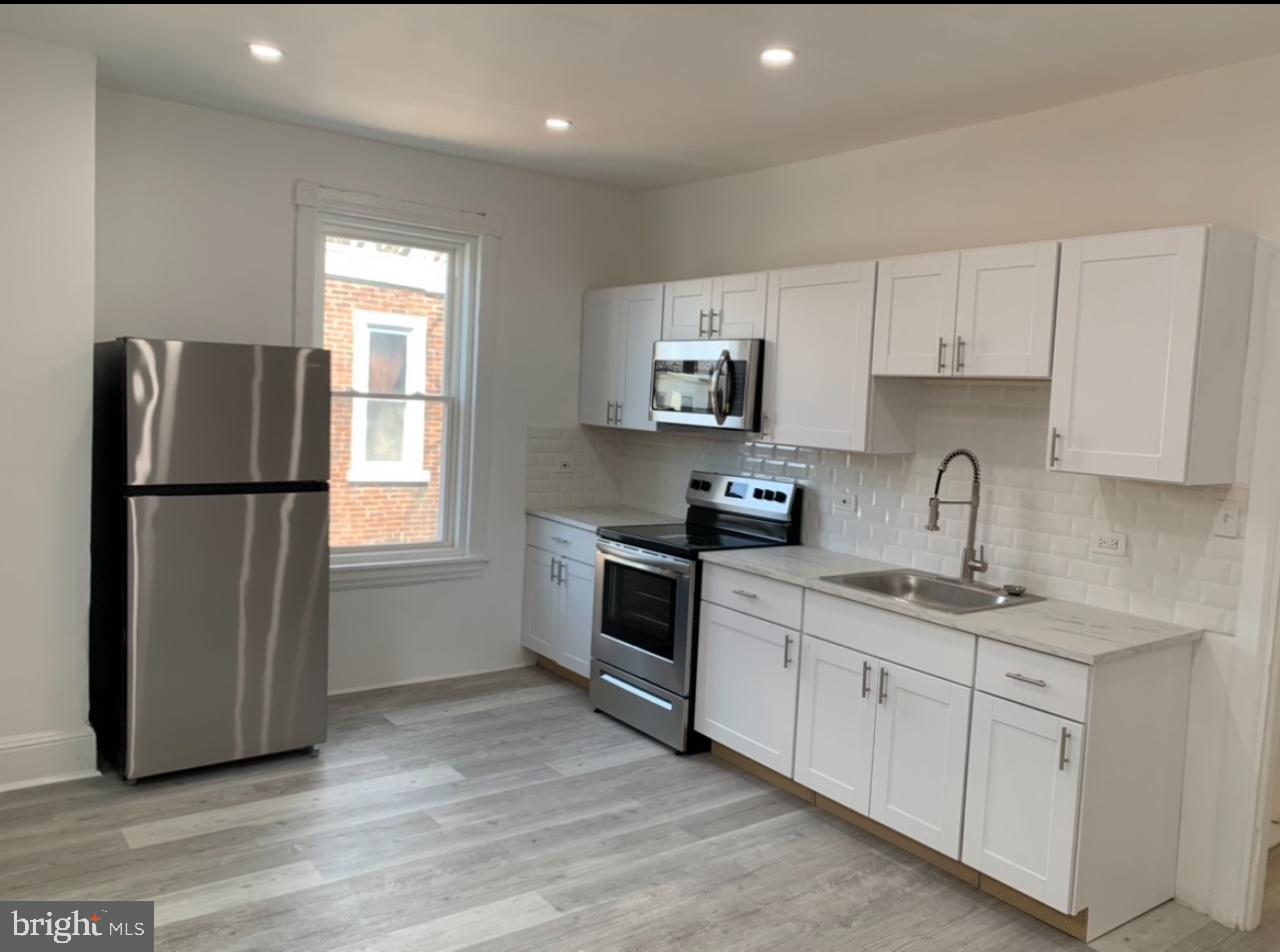 Welcome to 5718 Chester Avenue, an exceptional turnkey investment in the heart of Philadelphia’s thriving Kingsessing neighborhood! This fully rented property offers a remodeled duplex with two spacious residential units and a versatile 1,500 sq. ft. commercial space, providing multiple income streams for savvy investors. The duplex features a 2-bedroom, 1-bath unit and a 3-bedroom, 1-bath unit, both boasting modern updates including sleek flooring, contemporary kitchens with white shaker cabinets, stylish backsplashes, and newer appliances. The updated bathrooms showcase elegant tile work, modern vanities, and contemporary fixtures, creating a comfortable and stylish living space. Each unit is separately metered, with tenants responsible for their own utilities, ensuring low-maintenance ownership.
Adding to the value, the 1,500 sq. ft. commercial space, previously operated as an assisted living facility, offers incredible potential for a variety of uses, including medical offices, retail, professional services, or even residential conversion. With prime street visibility and high foot traffic, this space is perfect for an entrepreneur looking to establish a business or for an investor seeking additional rental income.
Located in a high-demand rental area, this property provides easy access to public transportation, local shops, dining, and all the best city conveniences. Whether you’re expanding your investment portfolio, looking for a dynamic live/work opportunity, or seeking a property with strong cash flow potential, 5718 Chester Avenue is a must-see! Don’t miss out on this rare opportunity – schedule your showing today!