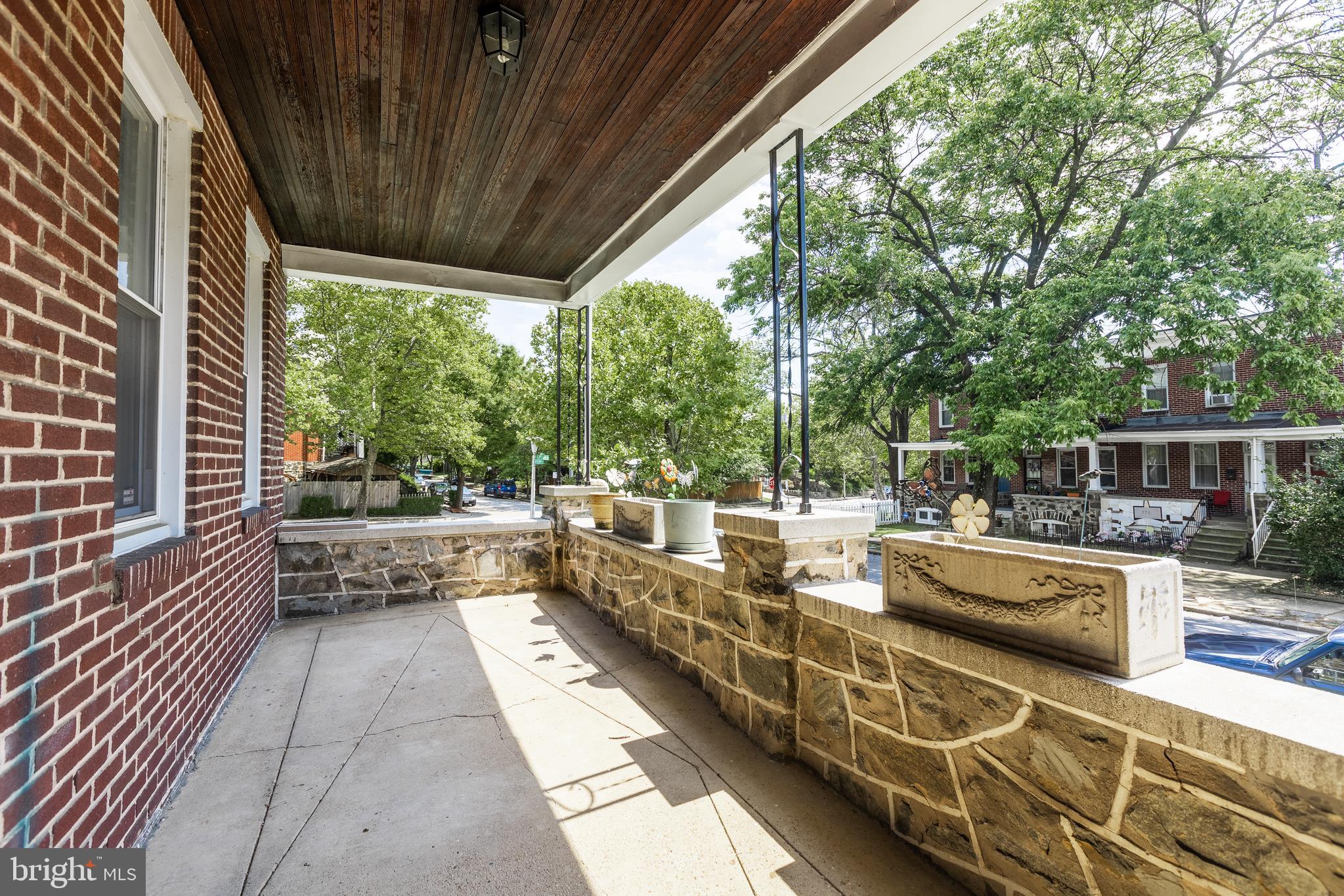 This 4 bed 2 bath end of group rowhome has great bones and is a fantastic opportunity to add equity with some personal touches. Quite a bit larger than the interior units, and a nice fenced in yard with CARPORT and parking pad in the rear of the home. Hardwood flooring, full bath on main level, washer/dryer, sump pump in basement. New boiler 2017, sump pump 2016, Investment potential!