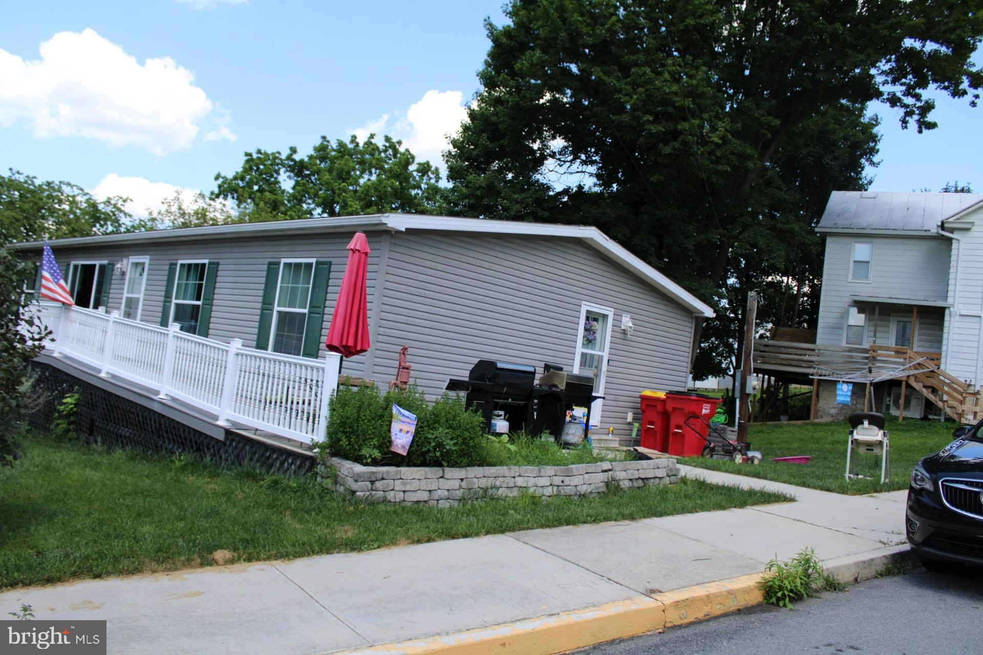 Discover this charming mobile home featuring enhanced gutters and meticulous homeowner-crafted
landscaping. A robust 2018 foundation offers peace of mind. Enjoy a significant selling point with the
added water treatment system. The kitchen boasts modern Whirlpool appliances. Flooring, including
linoleum and carpeting, is in good condition. The roof is approximately 6-7 years old.