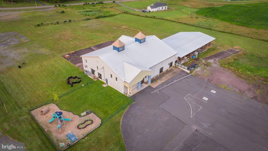 Versatile commercial opportunity on Bloom Road in Danville! This 9+ acre property features a 6,400+ sq ft building with a commercial kitchen, indoor gym, and multiple classrooms or office spaces, offering incredible flexibility for a wide range of uses. The layout is ideal for a school, daycare, office complex, training center, community facility, or specialty business. Located close to town yet offering plenty of open land, this site provides room to expand, add additional structures, or even potentially subdivide (subject to approvals). If you're looking for space, convenience, and long-term upside, this DCDC building and property checks all the boxes. Copy and paste link for drone video https://youtu.be/Md_tsabFfnA