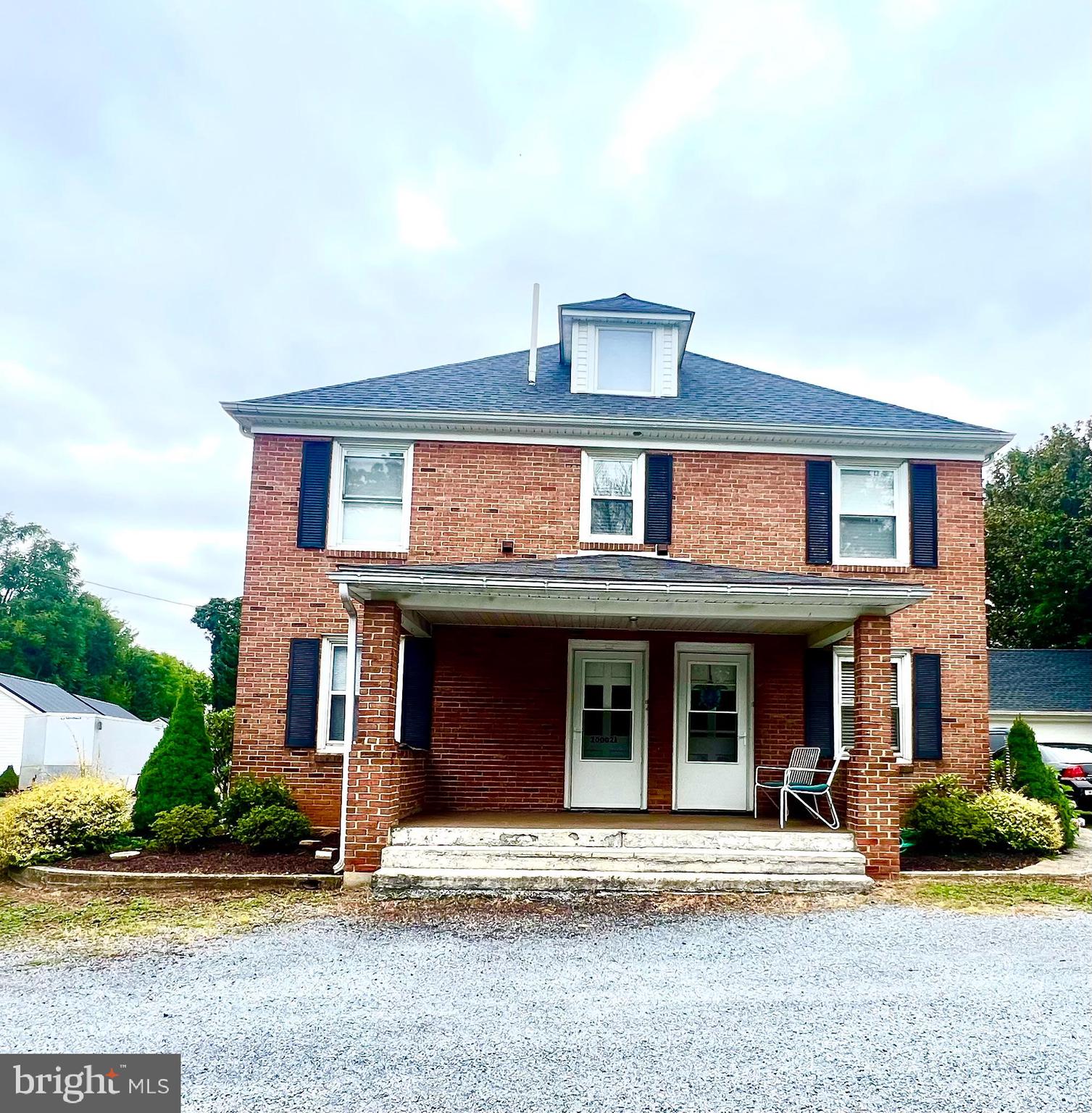 Recently Updated unit on 2nd and 3rd floors with in-unit Washer and Dryer and open floor plan with two bedrooms and a bathroom on 2nd floor and office/flex space on the 3rd floor. Half of the front porch on the ground level offers coverage for the vestibule and stairs to the 2nd floor and the gravel off-street parking offers parking for the tenant. Tenant is responsible for paying for all utilities other than water which is from a well. Due to well and septic, occupancy is limited to 3-4 water users.