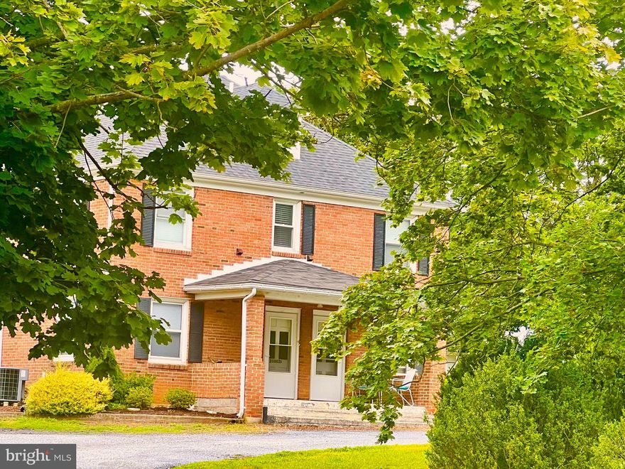 Recently Updated unit on 2nd and 3rd floors with in-unit Washer and Dryer and open floor plan with two bedrooms and a bathroom on 2nd floor and office/flex space on the 3rd floor. Half of the front porch on the ground level offers coverage for the vestibule and stairs to the 2nd floor and the gravel off-street parking offers parking for the tenant. Easy distance to I-70 and I-81. Tranquil area yet close to shopping, hospital, etc. Tenant is responsible for paying for all utilities other than water which is from a well. Due to well and septic, occupancy is limited to 3-4 water users. The property has multiple rentals so it is not a full use of the listed Sqft.