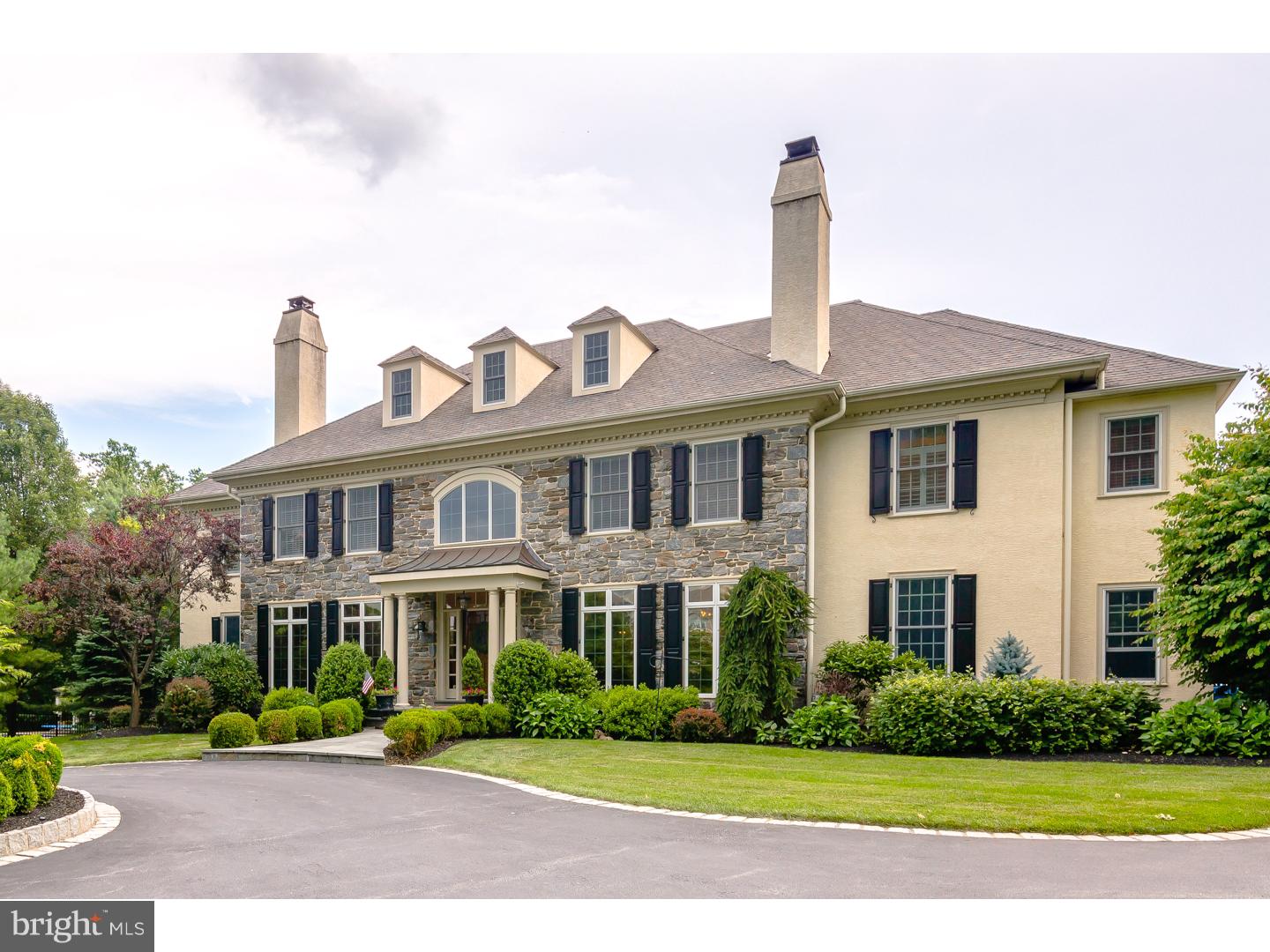 Welcome to this elegant Bentley built home featuring every upgrade imaginable! Two-story foyer w/grand staircase, wainscoting, and beautiful moldings at every threshold. Beautiful maple hardwood floors. Main floor w/formal LR w/gas fireplace w/marble surround, formal DR w/wainscoting, private office, and music/reading room. Stunning two-story family room w/floor to ceiling windows, floor to ceiling stone gas fireplace, back stairs to the 2nd level, & stairs to finished LL. Large gourmet chef's kitchen w/SS GE Profile double ovens (one with convection), SS GE Profile warming drawer, SS 6 burner wolf range top with grill, 2 GE Monogram dishwashers, built-in SubZero refrigerator, and SS GE Profile microwave. Large granite island w/prep sink and seating; a second larger sink and corner pantry along with a built-in desk and butler's pantry with built-in wine fridge. Sunny breakfast room adjacent to the kitchen w/windows on 3 sides overlooking the patio, pool, and backyard. Oversized pocket door in kitchen opens to mudroom w/built-in shelves and bench, large closet, 2nd half bath, door to driveway, and door to attached 3-car garage. A guest's powder room & coat closet are off the foyer. 2nd Level is split into two separate areas. One side w/private master suite w/his and hers walk-in closets, a dressing/vanity area with built-ins, large linen closet, and a luxurious master bath with oversized soak tub, tiled rain shower, private water closet, radiant heat, & expansive vanity w/double sinks and loads of storage. The other half of the 2nd level encompasses a large foyer with 4 BRs (2 have private baths, two share a jack and jill), a laundry room w/sink and storage, and stairs to the finished 3rd level (play room, office, or storage space). LL is an entertainer's dream space: Synthetic ICE RINK (use real ice skates on the "ice"); kitchen w/granite countertops, dishwasher, ice machine, mini-fridge, sink, and microwave; home gym; full bathroom; room for pool table and games; projector; separate room could be used for crafts or additional play area; and large windows allow light in and provide an egress. A private backyard oasis with flagstone patio, in-ground saltwater pool with automatic cover, separate hot tub, and large flat yard is just off the breakfast and living room. The home also has built-in surround sound that runs throughout the house and backyard, an indoor sprinkler system, and two HVAC zones.