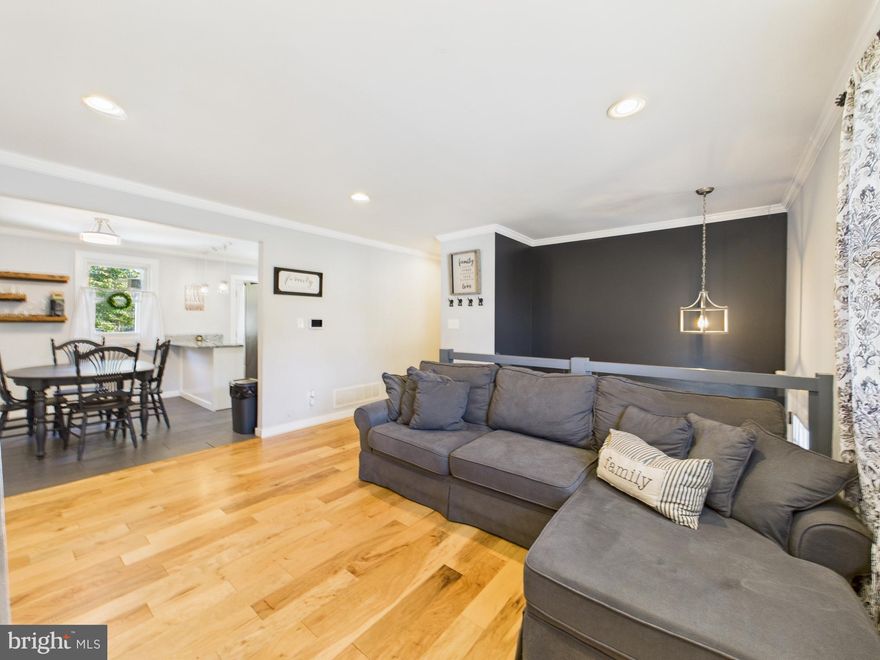 Sellers are open to providing a credit toward a 2/1 rate buydown — saving the buyer approximately $440 per month in the first year and $225 per month in the second year. For more details on the buydown program, reach out to Alicia Harkowa with Main Street Home Loans. New photos added to better showcase living areas.
Welcome Home! This beautifully renovated 4-bedroom, 2-bath home combines modern upgrades with timeless charm. The main level features gleaming hardwood floors, a stunning tiled kitchen with granite countertops, stainless steel appliances, and fully renovated bathroom. The spacious lower level offers a 4th bedroom, renovated bathroom and a stylish bar—perfect for entertaining family and friends. Step outside to a huge backyard on a .25-acre lot, ideal for summer gatherings and outdoor fun. Nestled in a water-oriented community, you’ll enjoy easy access to multiple marinas, making it perfect for boating enthusiasts. Just minutes from local dining, and with quick access to I-695 & I-95, convenience meets lifestyle in one perfect package. This home truly checks all the boxes—schedule your private showing today!