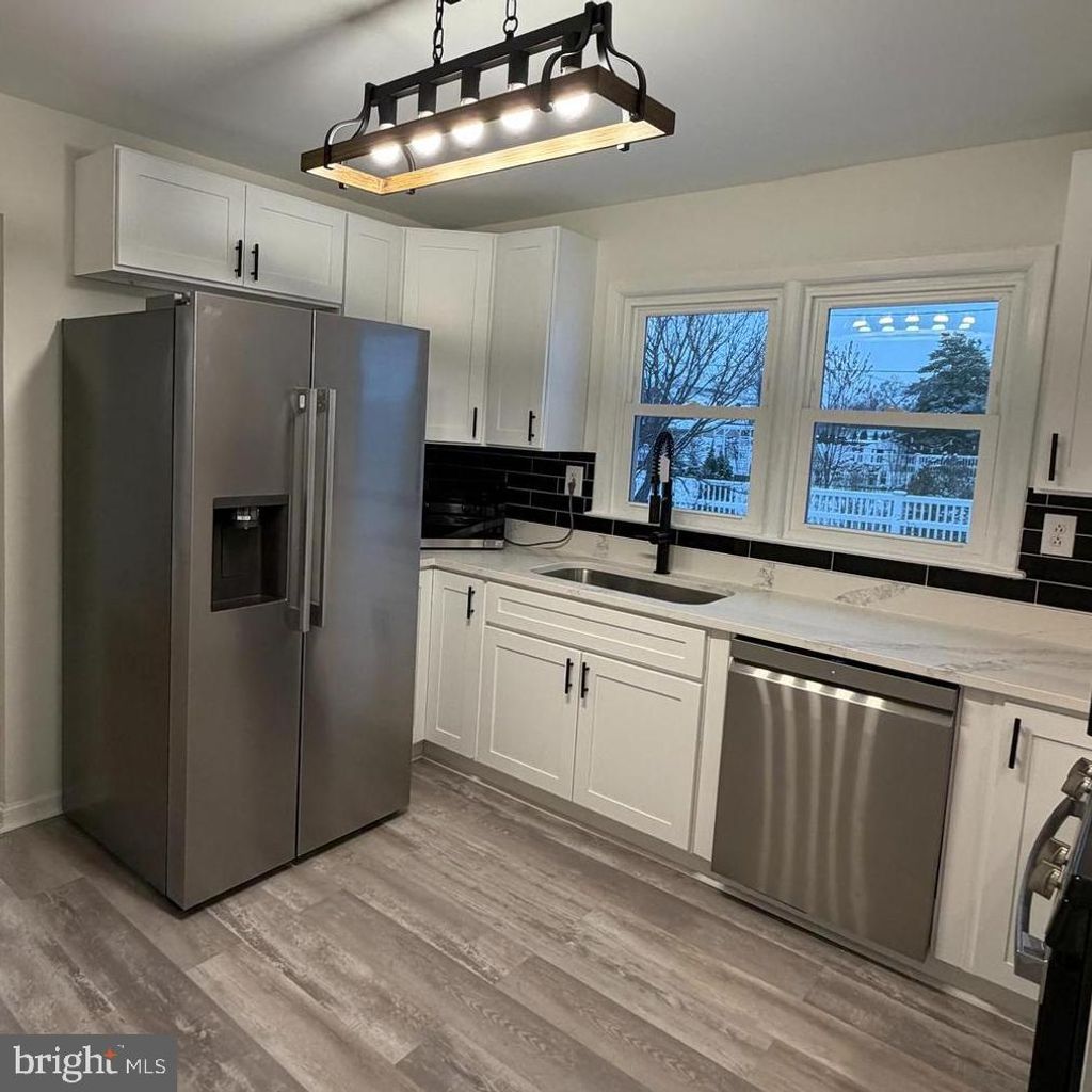 Photo of 701 E Maple Road, LINTHICUM HEIGHTS, MD 21090 (MLS # MDAA2132578)