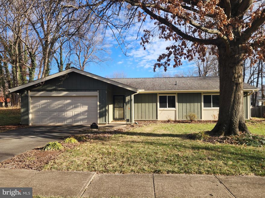 Located in the highly sought-after Hiddenbrook community, this meticulously maintained one-level ranch style home offers over 1,700 square feet of comfortable living on a quiet cul-de-sac street. The 3-bedroom, 2-bath home features exceptional indoor-outdoor living with a bright sunroom directly off kitchen, screened-in porch, and deck leading to a fully fenced, private rear yard—ideal for entertaining or quiet relaxation. Move-in ready with updated eat-in kitchen and baths, window treatments, hardwoods throughout and a wood burning fireplace in the spacious living room. The primary bedroom features an ensuite with walk-in shower, new vanity, and bidet toilet. A convenient laundry room and two-car garage complete the home.
Recent energy efficient and money saving updates include attic insulation (2025), HVAC system and roof replacement (2018),  baseboard hydronic electric radiators (2017) and thermostats (2023). Lawn care and termite protection plans have been in place, with low HOA dues of $212 annually. Membership to the Hiddenbrook community pool and tennis club is optional, plus close proximity to Reston Town Center, Dulles Town Center, major roadways, Herndon Metro, and Dulles International Airport.