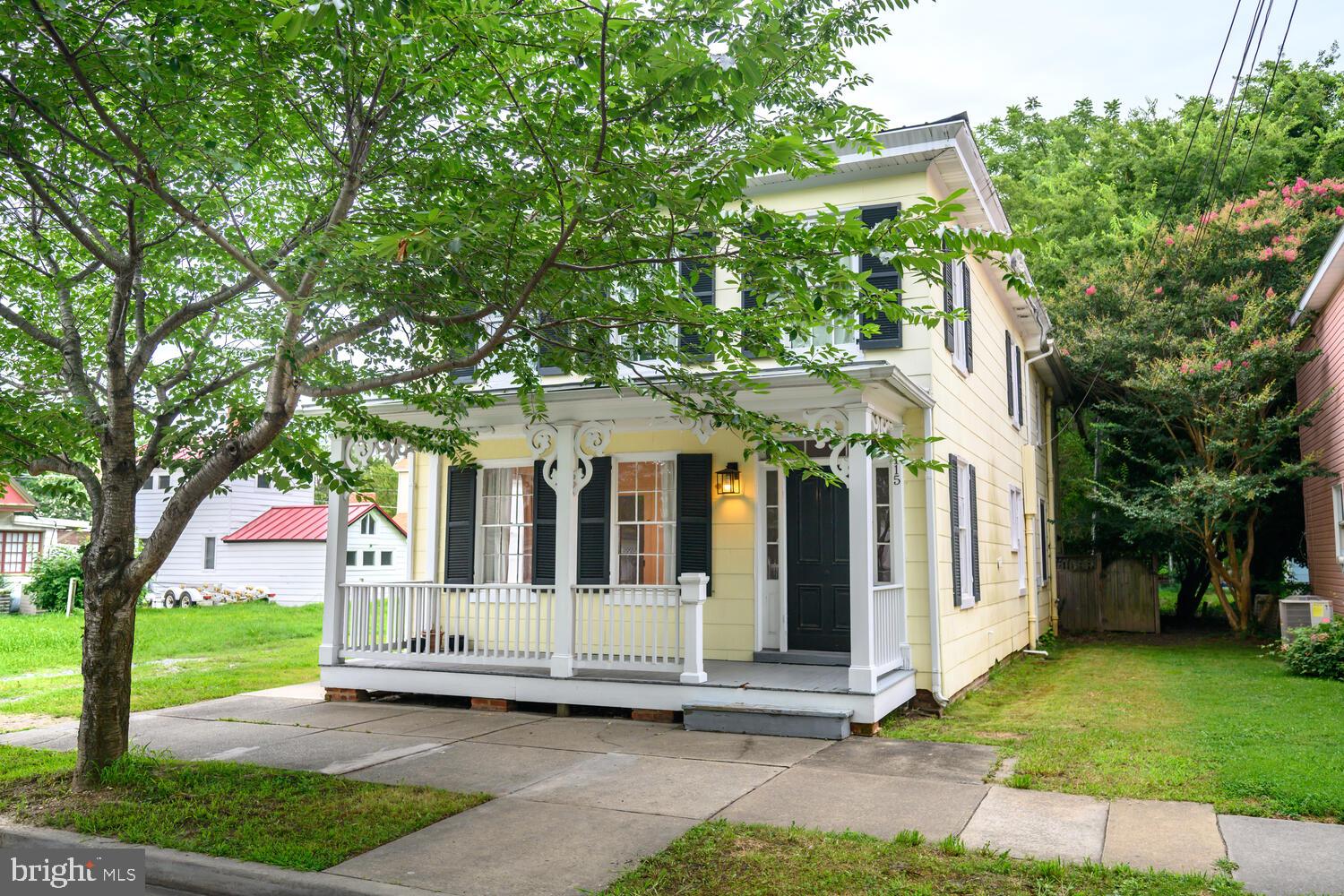 Don’t miss this rare opportunity to own a beautifully maintained two-unit multifamily home in the heart of downtown Easton—one of Maryland’s most vibrant and beloved communities. This property combines timeless curb appeal and a prominent front porch with a prime location near Easton’s award-winning restaurants, galleries, shops, and the Avalon Theatre—offering both small-town charm and vibrant lifestyle potential. Originally built with historic character and now thoughtfully updated with modern amenities, this property offers versatility to match your needs. Live in one unit and rent the other, use as a full investment property, or easily convert it back to a spacious single-family home—the choice is yours. Each unit features its own entrance and separate electric meters, offering convenience and privacy for residents. Inside, you'll find classic hardwood floors throughout, granite countertops, newer appliances, and abundant natural light. The downstairs unit has been recently upgraded with a high-efficiency split HVAC system for year-round comfort. Reliable high-speed internet and cable are available through Easton Utilities—ideal for remote workers or tenants who want both charm and connectivity. Whether you're an investor, a homeowner seeking rental income, or simply looking to enjoy the unmatched quality of life in downtown Easton, this property is a must-see.