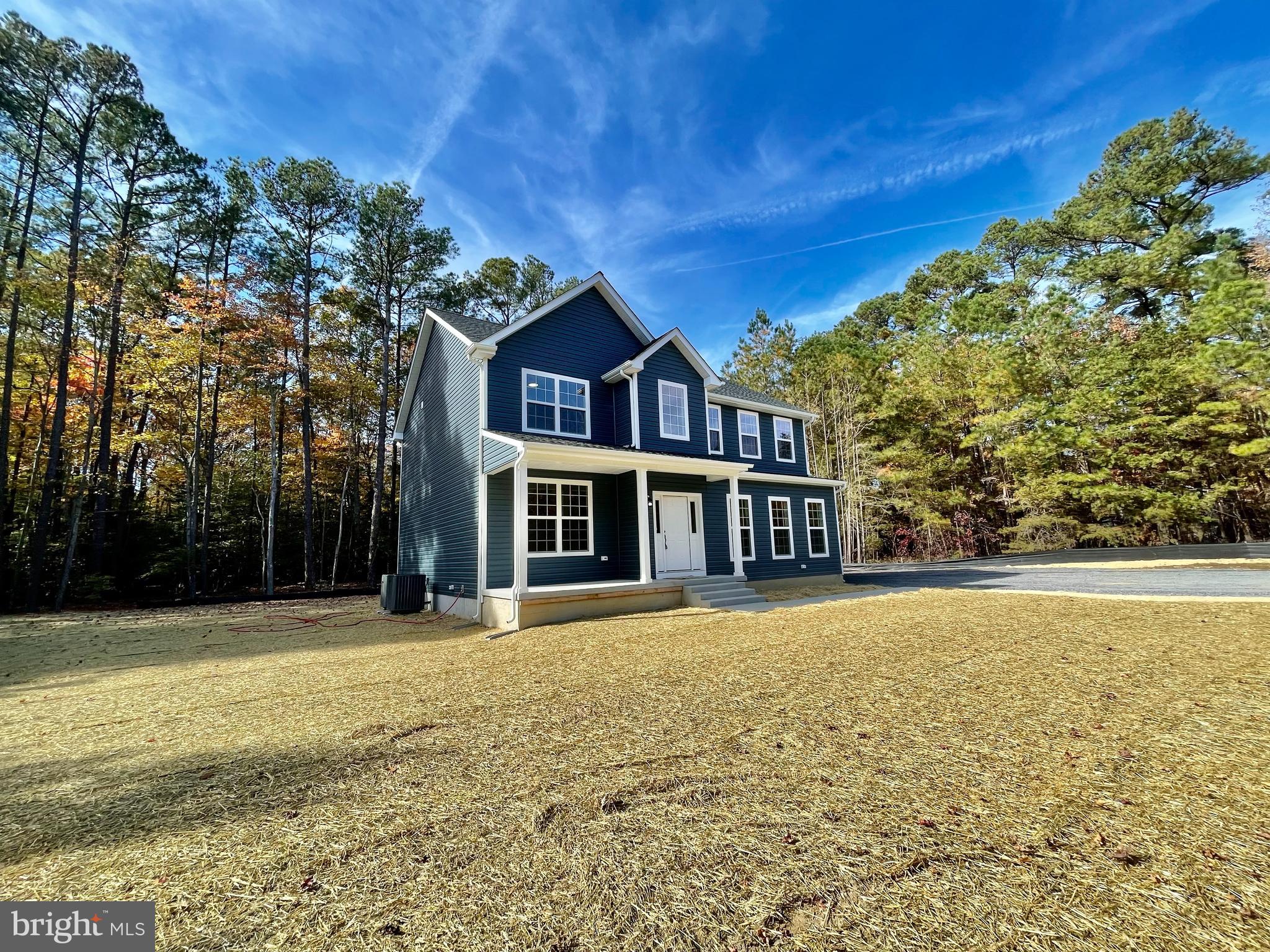 NEW & MOVE IN READY!!! This spacious 4-bedroom, 2.5-bath home, offers a modern and inviting layout. The main level showcases durable vinyl plank flooring. The kitchen features, complete with 42" white cabinets, elegant granite countertops, a center island, and stainless steel appliances, perfect for both cooking and entertaining. The primary suite bathroom featuring a double vanity, a beautifully tiled shower, and a spacious walk-in closet. A 2-car side-load garage and a welcoming front porch perfect for relaxing. Designed for comfort and style, this home is perfect for your family’s lifestyle. Plus, it’s just a short drive to PAX NAS and only minutes from Elm’s Beach, offering both convenience and leisure!