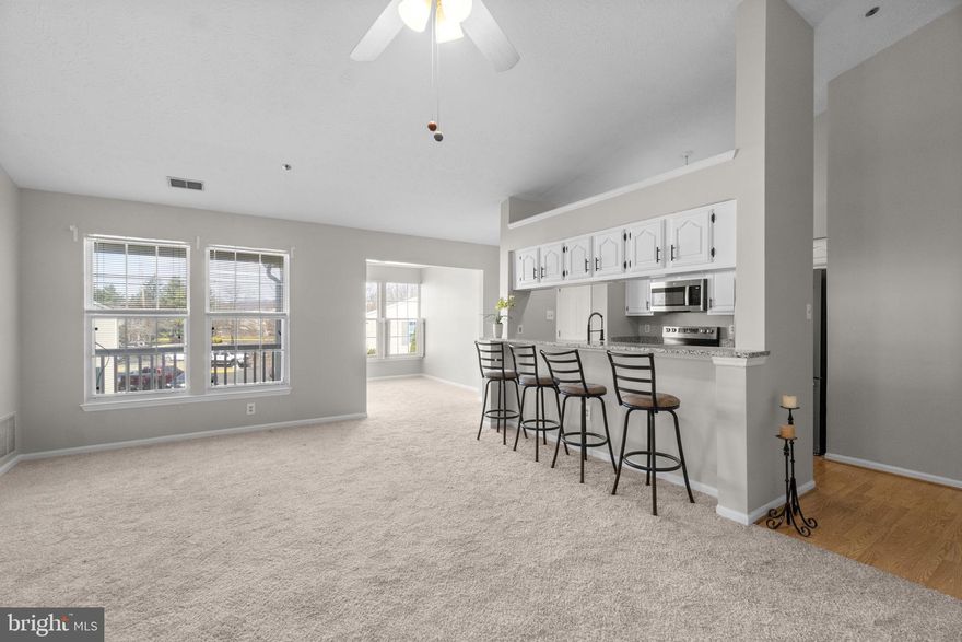 Top-Floor Living Near Downtown Frederick – Now Beautifully Updated
Step into this sunlit 2-bedroom, 2-bath penthouse condo and experience comfort, convenience, and thoughtful updates throughout. With vaulted ceilings, fresh paint, and brand-new carpet, this home offers a bright and inviting atmosphere from the moment you walk in.
The kitchen has been tastefully refreshed to blend style and function; featuring newly painted cabinetry with updated hardware, sleek granite countertops, a modern adjustable faucet, and stainless steel appliances, including a newly added built-in microwave. The breakfast bar seamlessly connects to the dining and living areas, making everyday living and entertaining effortless.
The open-concept layout feels airy and expansive, perfect for relaxing by the cozy fireplace, enjoying morning coffee in the sunroom, or unwinding on your private balcony.
Both bathrooms have been updated, offering a clean, modern feel that complements the home’s overall aesthetic. The spacious primary suite includes a walk-in closet and private bath, while the second bedroom and full bath provide flexibility for guests, a home office, or additional living space.
Additional highlights include in-unit laundry and top-floor privacy   no neighbors above you.
Located just minutes from Downtown Frederick, you’ll enjoy easy access to local shops, restaurants, and year-round events, all while coming home to your peaceful retreat.
This home qualifies for the exclusive PenFed Credit Union VIB Loan Program, offering great rates and a range of fee waivers that can translate into meaningful savings at closing, making homeownership more affordable from day one.