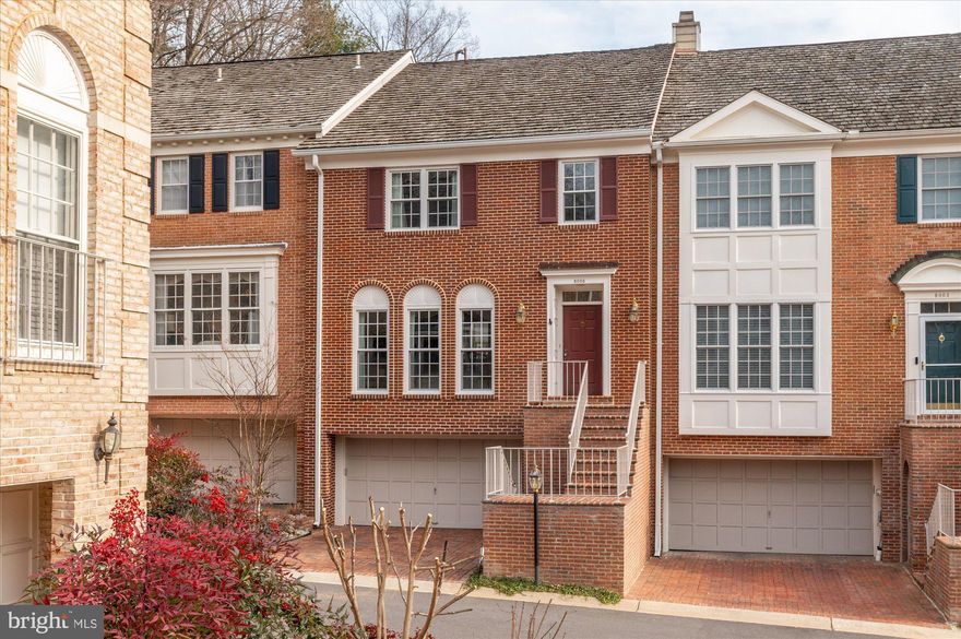Open Saturday and Sunday 2-4 Location, lifestyle, and livability come together in this ideally situated townhome within the highly coveted Mitchell & Best community of River hill. This turnkey, four-level residence offers effortless, low-maintenance living and features an attached garage and a charming Georgetown-style brick patio, making it an exceptional opportunity for today’s discerning buyer. Thoughtful design and fine craftsmanship are showcased throughout the home, most notably in the inviting Family Room, highlighted by woodburning fireplace, French doors to a balcony, and a beautiful painted beam ceiling.   Open to the Family Room, the recently renovated, chef’s kitchen is both functional and crisp, offering quartz countertop, 42” white cabinets, stainless steel appliances and a sun-filled bay window breakfast area. The main level is completed by formal Living and Dining Rooms, paneled powder room and all finished with hardwood flooring. The second level is anchored by a spacious Primary Suite that serves as a private retreat, featuring soaring vaulted ceilings, two walk-in closets, and a luxurious ensuite bathroom with double vanities, claw foot soaking tub, and a separate stall shower. Two additional bedrooms, a full hall bathroom, and a conveniently located upper-level laundry room complete this floor. On the third level is the 4th bedroom, with a vaulted ceiling, cedar lined double closets, wall-to wall-carpeting and separate storage.
The lower level expands the living space with a large walk-out, Recreation Room featuring floor-to-ceiling windows and 2 walls of built-in bookcases. A bonus area offers flexibility as a home gym or mud room, and the entire area is complemented by a half bath, and access to the patio and garage.
Ideally located just off the I-495 Beltway, this home offers unparalleled convenience. National and Dulles International Airports are approximately 25 minutes away during non-rush hours, with easy access to downtown Washington, D.C., Tysons Corner, and I-270. Also nearby  is the Cabin John Trail which provides a peaceful escape into nature for walking and recreation.