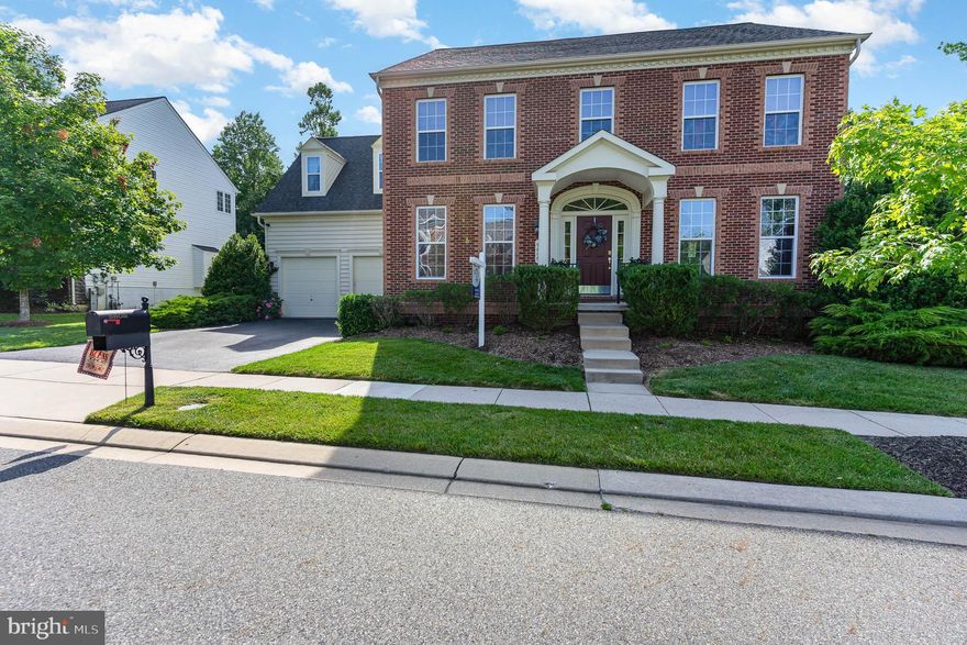 Located towards the back of this cul de sac community this well cared for home is sure to please.  As you enter the home  your immediately impressed by the open floorplan & luxury feel that an NV built home provides. This center hall colonial home features a formal living room to one side and formal dining room to the opposite side.  Hardwood floors, decorative columns and upgraded trim decorate this home on the first level. There is a first floor office which opens both from the foyer as well as the family room. The eat in kitchen offers plenty of countertop space, backsplash, wall oven, island and butler pantry. The kitchen is open to the spacious family room with gas fireplace.  The kitchen provides easy access to your large composite deck with steps to the patio below. The deck offers tremendous privacy as this home backs to mature trees. The upper level features an elegant primary suite with sitting room, primary bath & walk in his and hers closets.  Bedroom 2 rivals the primary bedroom in size and features its own private bath.  Bedroom 3 and Bedroom 4 are also quite spacious. Bedroom 3 has its own private entrance into the Hall Bath for added luxury.  The laundry area is located on the upper level for your convenience. The lower level is fully finished and features a spacious rec room with wet bar and gas fireplace with raised hearth. The rec room has a walkout exit which leads to a large patio located under the deck for additional outdoor entertaining. There is also a 5th bedroom and additional full bath in the lower level.  The owner has enhanced the outdoor deck and patio with an irrigation system which makes caring for the hanging potted plants a breeze.  Schedule your showing today!