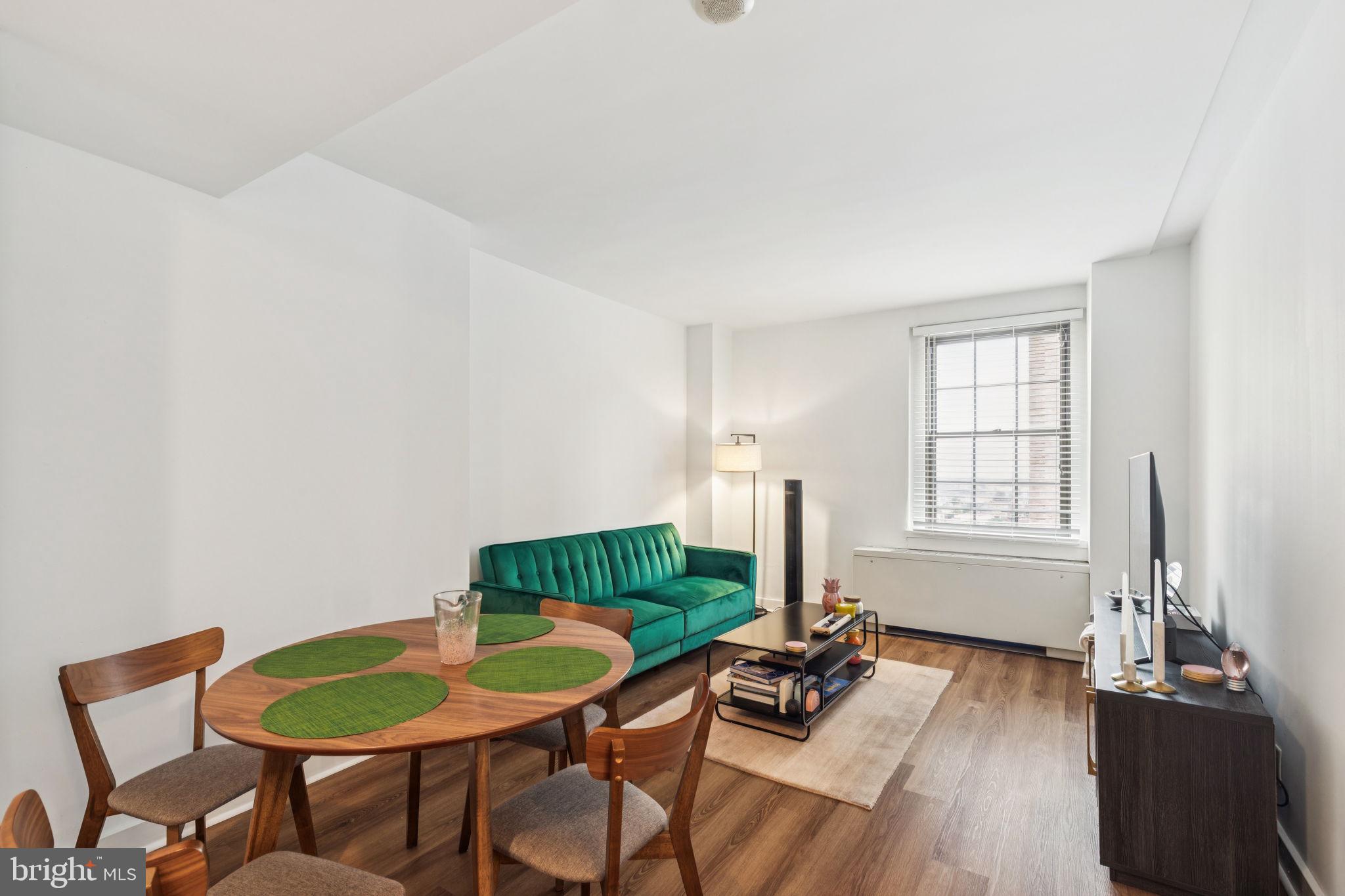 Sun-soaked one bedroom with southern city views at Parc Rittenhouse right on Rittenhouse Square! Enter into the open great room with large coat closet, ample space for living and dining, and an oversized window showcasing see-forever southern vistas. Adjacent is the updated galley kitchen with flat white cabinetry, granite countertops, stainless steel appliances, and tile floor. The generously sized bedroom enjoys another large window, excellent closet space, and use of a full hall bathroom boasting a white modern vanity with marble top and a tub shower with white tilework. There are new vinyl floors in the living area and a combo washer/dryer in the kitchen. Residents of Parc Rittenhouse enjoy world class amenities and services including a 24 hour doorman; an amenities suite that includes a brand new state-of-the-art fitness center and resident lounge with pantry; media room; outdoor rooftop pool club with a large pool deck, full size pool, kids pool and hot tub; garage parking below the building for an additional fee; and two amazing restaurants on the ground floor, Stephen Starr’s Parc and Via Locusta. Rittenhouse Square is ranked the 6th best neighborhood in North America by Places Rated Almanac. 175 restaurants and 199 retailers within a three block radius. Within close walking distance to the Market Street office corridor, The Avenue of the Arts and University City. 30th Street Station and Philadelphia International Airport are only minutes away