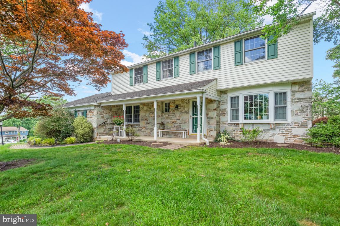4-bed, 2.5 bath colonial, built in 1972, sits on a .46-acre lot in the Council Rock School District. Enter through the foyer, where to the right, a family room with French doors opens to the outside. This flows into the living room, featuring a wood-burning fireplace that connects seamlessly to the kitchen and a separate dining area. Off the kitchen, a mudroom/laundry room with coat and shoe storage, and a storage closet turned small office space with a window. Access from the Mudroom to the backyard patio. The mudroom also provides indoor access to the two-car garage. Upstairs features four bedrooms and a Full Hall Bath. Primary Bedroom Full Bath. All bedrooms have original hardwood floors. Pull-down attic in the hallway. There’s a full basement for storage or customization. Nestled in a peaceful, quiet neighborhood, this home is ready for your style.