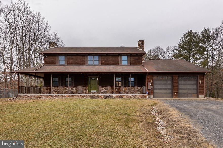 Beautiful large home on 46.5 acres with pool, hot tub, sauna and four stall barn.  House is located on a very private lot with open space and seasonal views.  Main level has a huge family room with wood burning fireplace and a second living room with a  wood burning fireplace off  kitchen. Kitchen  is spacious with large  island and separate dining area.  The spa on the main level is fully equipped with a sauna, hot tub, lap pool, shower, and indoor  grill.  Full bath off kitchen includes washer & dryer.  Two car garage has an entrance to the kitchen and also an entrance to the basement. Upper level  has a primary bedroom and bath plus 3 additional bedrooms  and one additional bathroom.  The large barn is ready for your animals with 4 stalls and a tack room.  There is also  a underground electric dog fence.  Home is being sold " AS IS"