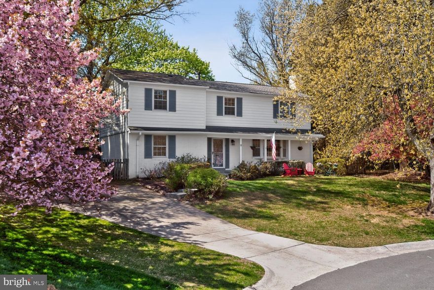 Some houses don't need a person to invite you in...and 7 Greenlane Court is one of those. Situated on a quiet Potomac cul-de-sac, the blue and white beauty greets you with a covered porch framed by azaleas, hydrangeas, roses and more. Inside you'll find 2,600 sq. ft. across two levels, as well as the opportunity to add even more finished space downstairs.

With hardwood floors throughout, the main level opens to a light-filled living room with wood-burning fireplace and easy flow to a charming dining room. The inviting eat-in kitchen checks all the boxes and has a picture window overlooking and with easy access to a peaceful backyard. The family room is a spacious retreat for relaxation and entertaining, extended by the screened in porch where you can take in the outdoors without being eaten alive. Rounding out the first floor, you'll find the essential powder room, as well as a den that could easily be a home office, mudroom or even be converted to a main level laundry.

Upstairs is a rare find: five full-sized bedrooms (paired with three full bathrooms). As you enter the primary suite, you'll appreciate the space for your king-sized bed and much more, as well as the renovated en suite bathroom, walk-in closet and dressing area - offering the perfect space for all your fashions and even the opportunity to easily expand the footprint of the bathroom further in the future. Three more bedrooms off the hall share a second renovated bathroom...and the fifth bedroom includes an oversized closet and en suite bathroom (as well as access to the attic for even more storage space).

Outside you'll enjoy parking for 3+ cars in the driveway and an EV charger. Through the gate is a fully-fenced, flat backyard with plenty of space for gardening, play, welcoming guests and your four-legged family member(s). Situated in the Beverly Farms-Hoover-Churchill pyramid (all under 0.8 miles from the front door), you're just off Tuckerman Lane, minutes to 270 and close to parks, pools, grocery, dining and more.

With a long list of updates - from the roof & gutters (2019) to HVAC (2022) and water heater (2025), this special home won't last long, so schedule your private tour or stop by one of two open houses this weekend!