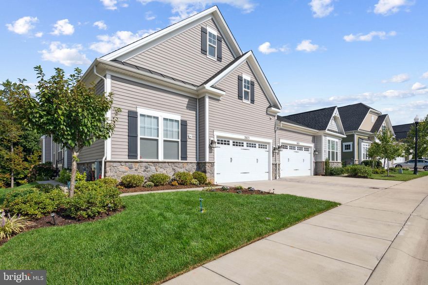 Look no further, we've found the place that you've been dreaming of! Experience the epitome of comfortable and convenient living in this three-bedroom, three-full bath haven nestled at 2673 Dragon Fly Way in the sought-after 55+ section of Two Rivers, Odenton, MD. The heart of the home boasts a well-appointed gourmet kitchen with stone counters, stainless steel appliances, gas cooking, and a spacious pantry. Step into an oasis of tranquility as you unwind on the generous screened porch just off the great room, offering breathtaking views of woods and a soothing walking trail. The bedrooms are a true zen retreat, with plush carpeting in soft neutral colors to promote restful sleep, and ceiling fans to provide comfort year-round. Lower level features a huge recreation room, full wet bar, full bath and a massive guest room for your guests comfort. With a two-car garage complete with storage shelves and a lawn irrigation system, every detail has been thoughtfully designed. Within this vibrant community, enjoy a plethora of amenities tailored to enrich your lifestyle. A 55+ only clubhouse beckons with its indoor/outdoor pool, game room, and fitness center, offering a space to connect and unwind. Community pickleball and tennis courts, along with walking trails, ensure endless recreational opportunities. Lawn and snow maintenance are thoughtfully included in the HOA. Welcome to a new chapter of living that embraces both comfort and luxury. Make 2673 Dragon Fly Way your address in the heart of the Two Rivers community.