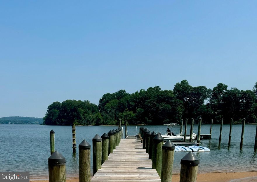 Waterfront retreat offering spectacular views of Cabin John’s Creek and its confluence with the Elk River!   Strategically located on high ground, you will have fascinating views of ships from around the world as they head to and from the Chesapeake & Delaware Canal.  Offering 6,404 square feet of high quality, high comfort living area, with water views from all four levels serviced by a convenient elevator or good old fashion stairs.  Your family & friends will have plenty of room to spread out with six bedrooms, four and a half baths and a finished walkout daylight basement. The property encompasses 1.78 acres with about 266 feet of water frontage with five feet of water at mean low tide!  So, bring your boats and jet skis and tie them up to the private deep-water dock complete with lighting, electric & potable water.  If you enjoy nature, you will be treated to views of American Bald Eagles, Osprey, deer, wild turkeys and more!