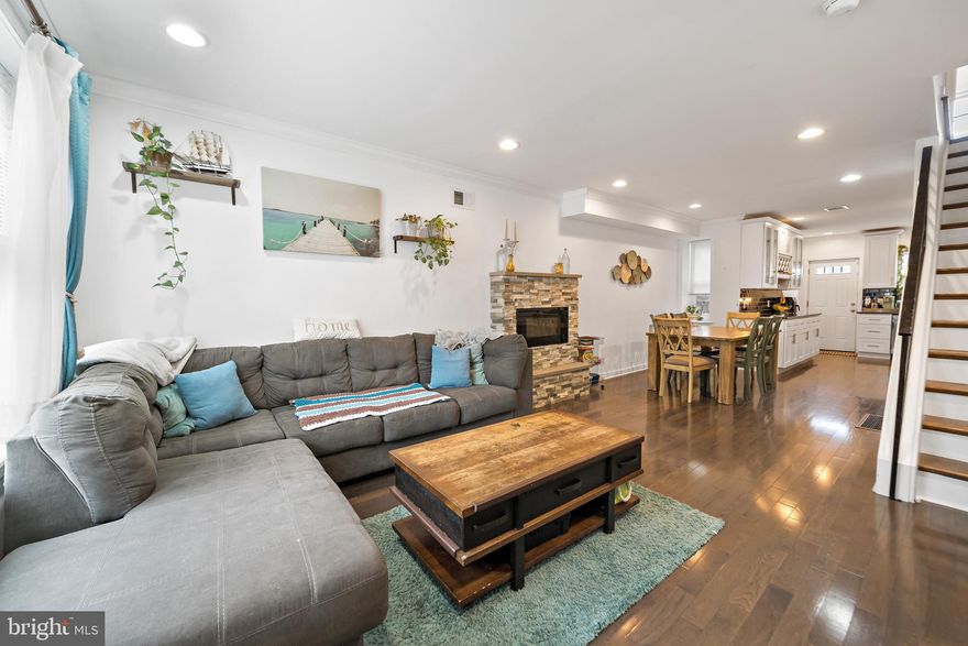 Welcome to1214 S Bonsall Street, a meticulously renovated 3-bedroom, 3-bathroom contemporary townhouse in between Point Breeze/ Grays Ferry neighborhoods. This 1,700 sq ft home offers modern amenities and stylish finishes across three levels, plus a finished basement where there is a 4th bedroom, bathroom, & bonus room.​  The open-concept living and dining area features new hardwood floors and an electric fireplace with a custom stone hearth. The adjacent kitchen boasts stainless steel appliances, and a custom tile backsplash. A rear door leads to a fenced-in backyard, ideal for outdoor gatherings.​ The second level includes two bedrooms, a laundry room, and a full bath.  The primary suite offers a spacious layout with a large walk-in closet. The en-suite bathroom includes double sinks, a soaking tub, and a separate shower with custom tiling and a glass enclosure.​ There is a small deck off of the Primary bedroom.  There is 
a large roof deck above the Primary suite which offers breathtaking views of the city. This location is perfect- you are minutes to Rittenhouse Square. You can walk to Dock Street Brewery, American Sardine Bar, and so much more that Philadelphia has to offer.  Landlord is willing to leave some furniture!