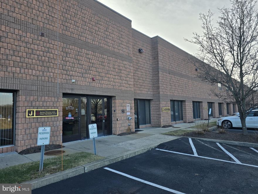 Prime Light Industrial Warehouse for Lease – Unit J – A versatile 5,424 SF light industrial space in Hatfield Township, Montgomery County! This well-appointed unit features 3,993 SF of warehouse space with 20' clear span ceilings, high-efficiency gas-fired infrared tube heaters, and a loading dock with leveler (plus a knockout for an additional dock or drive-in door). The warehouse also includes a breakroom with kitchenette and a restroom for added convenience.  The 1,431 SF office/showroom area offers a welcoming front entrance, two private offices, a restroom, and central air & heat, ensuring a comfortable work environment. 120/208 Volt 3-Phase Electric Service supports a range of industrial and business needs. Two assigned parking spots with ample overflow parking. Don’t miss this opportunity to secure a highly functional industrial space in a sought-after location!  Contact us today to schedule a tour!
