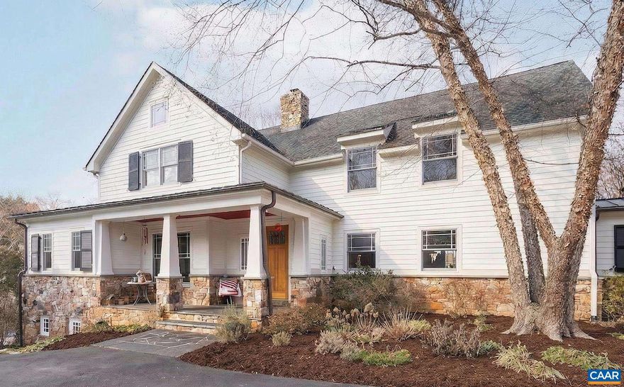 Nestled privately overlooking Blue Ridge views, this totally custom 5 bedroom 4.5 bath Arts & Crafts farmhouse is truly a remarkable offering built by the current owners who spared no expense creating this unique residence. From the beautiful heart pine floors to the incredible dry laid stonework at the massive family room fireplace to the wonderful bluestone terrace  & Buckingham slate covered patio & screened-in porch overlooking the views, there are wonderful, timeless finish details at every turn. The 3 car garage is accessed via covered breezeway. A small creek runs along the back of the property. Other noteworthy features incl' an expansive 1st floor primary, whole house generator, fiber internet, and 4 HVAC zones w/ hydrothermal heating w/ ultra-high efficiency gas fired boiler. The large mudroom has sink & built-in cubbies. Flooring incl' heart pine, Buckingham slate & marble.  Other notable extras include a wet bar, extensive wainscotting & built-ins incl' window seats. The kitchen showcases completely custom, solid wood cabinetry, honed granite counters, 48" fridge, Wolf gas cooktop w/ commercial hood, warming drawer, double ovens & wooden center island. Please see the detailed list of features in the documents tab.,Granite Counter,Wood Cabinets,Wood Counter,Fireplace in Family Room